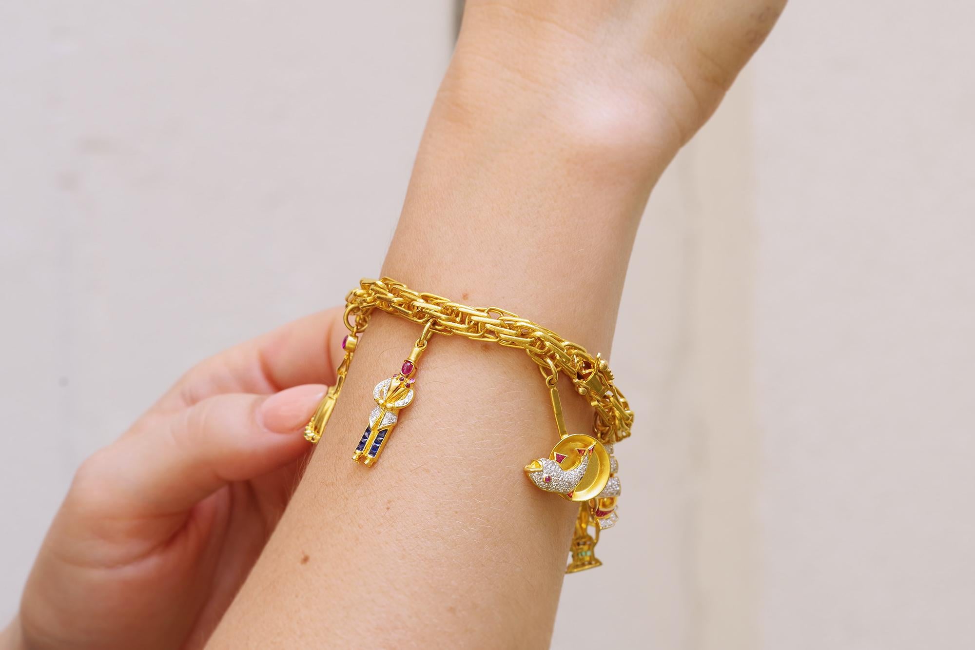 Women's Charms bracelet in 18k yellow gold, ship, lantern, flower, dancer