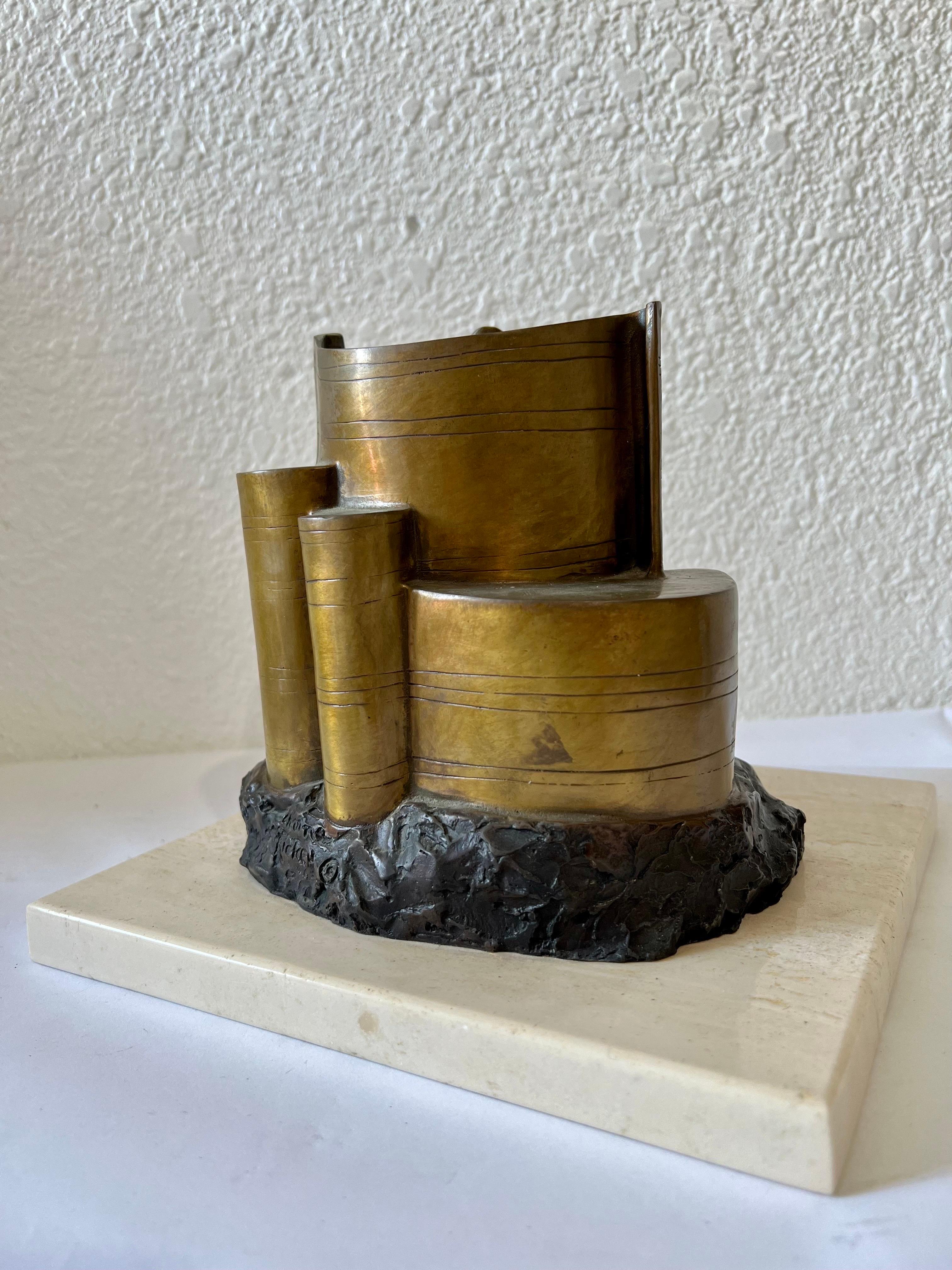 Charna Rickey 1923 - 2000 Mexican-American Jewish Woman artist.
Signed Bronze House of Books, Architecture Bronze sculpture, signed Charna Rickey and on the front "House of the book." It depicts an open Torah. Original patina.
Approx. dimensions: 7