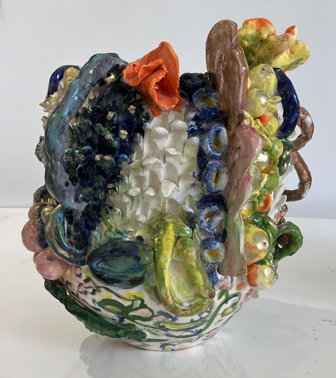 Green twirls flowers, by Charo Oquet
Glazed Ceramic Abstract Sculpture Vase
18” x 16” x 14”
2018

These gravity-defying ceramics stacked constructions struggle to soar beyond the boundaries of the spaces that contain them, often appearing to teeter