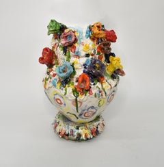 Colored flowers. Glazed ceramic sculpture