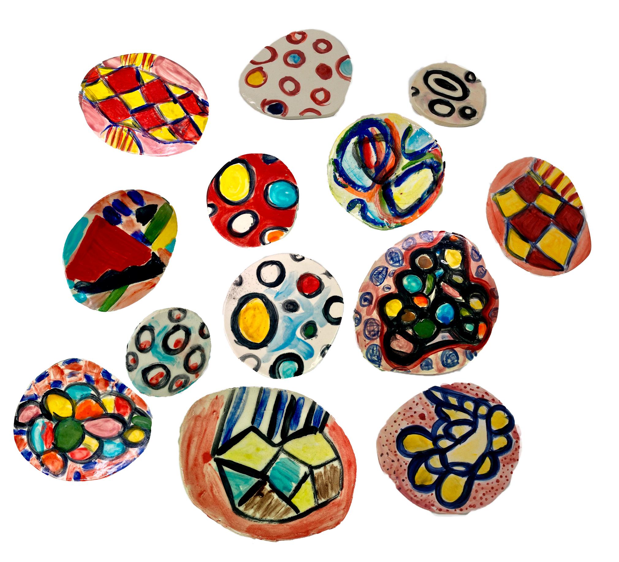 Charo Oquet Abstract Sculpture - Wall Abstract sculpture Untitled XXII. Set of 13 Glazed Ceramic Discs