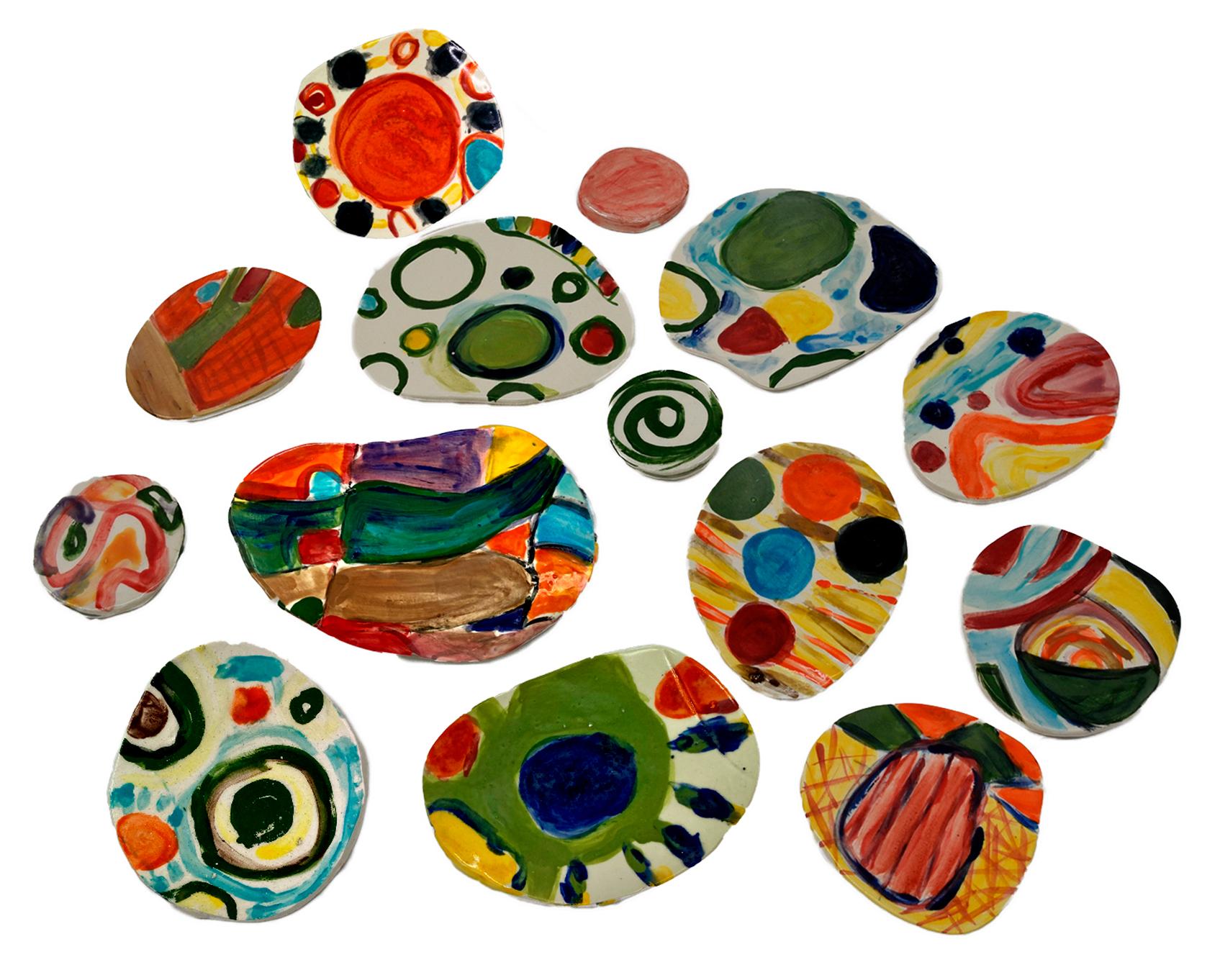 Charo Oquet Abstract Sculpture - Wall Abstract sculpture Untitled XXIII. Set of 14 Glazed Ceramic Discs