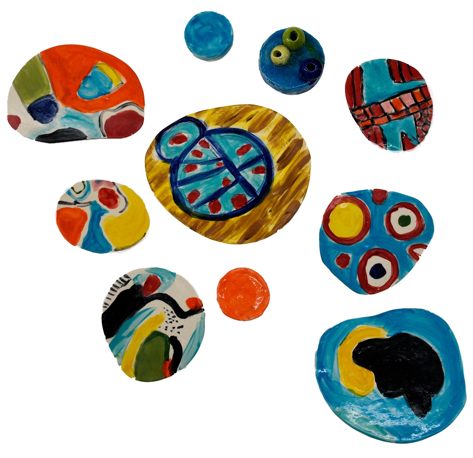 Charo Oquet Still-Life Sculpture - Wall sculpture Untitled XXVI. Set of 10 Glazed Ceramic Discs