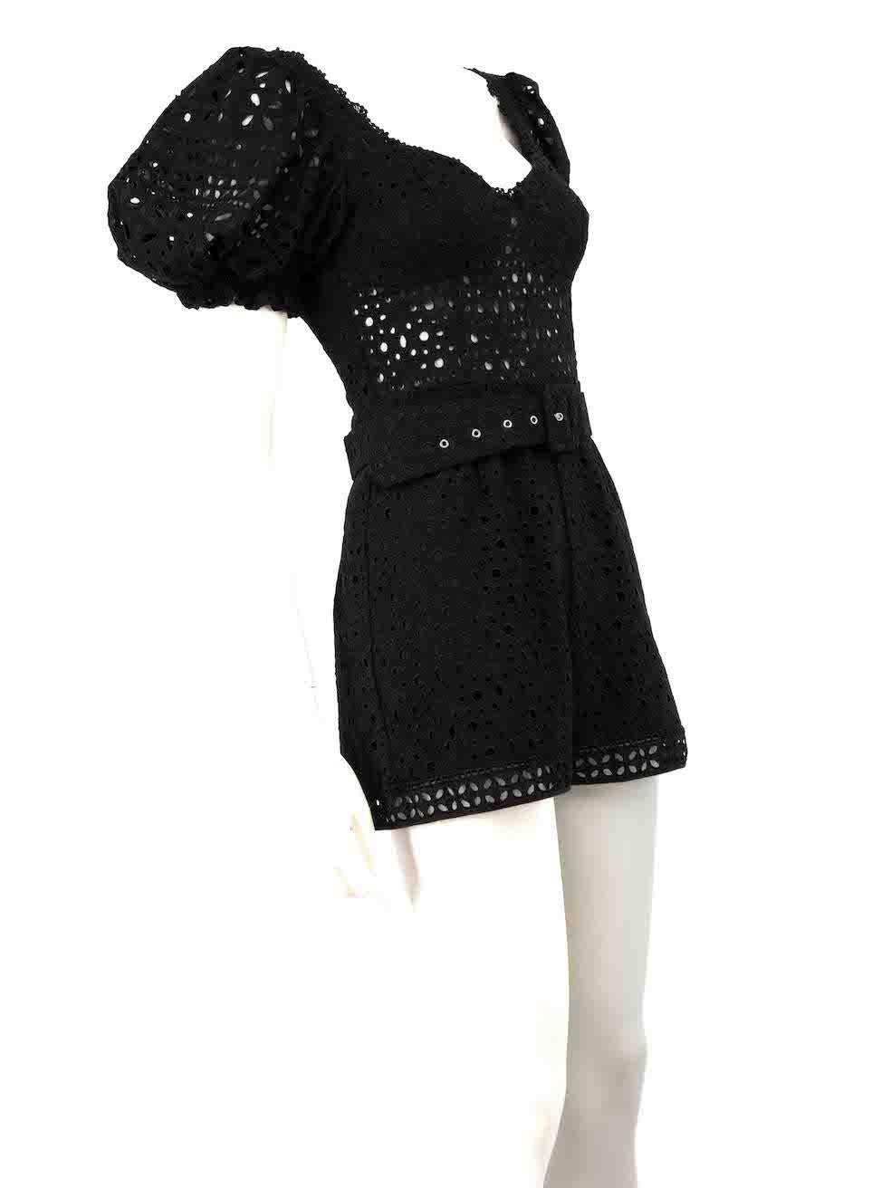 CONDITION is Very good. Minimal wear to playsuit is evident where the buckle finishing on belt is slightly frayed on this used Charo Ruiz designer resale item.
 
 
 
 Details
 
 
 Black
 
 Cotton
 
 Playsuit
 
 Broderie anglaise
 
 Short puff