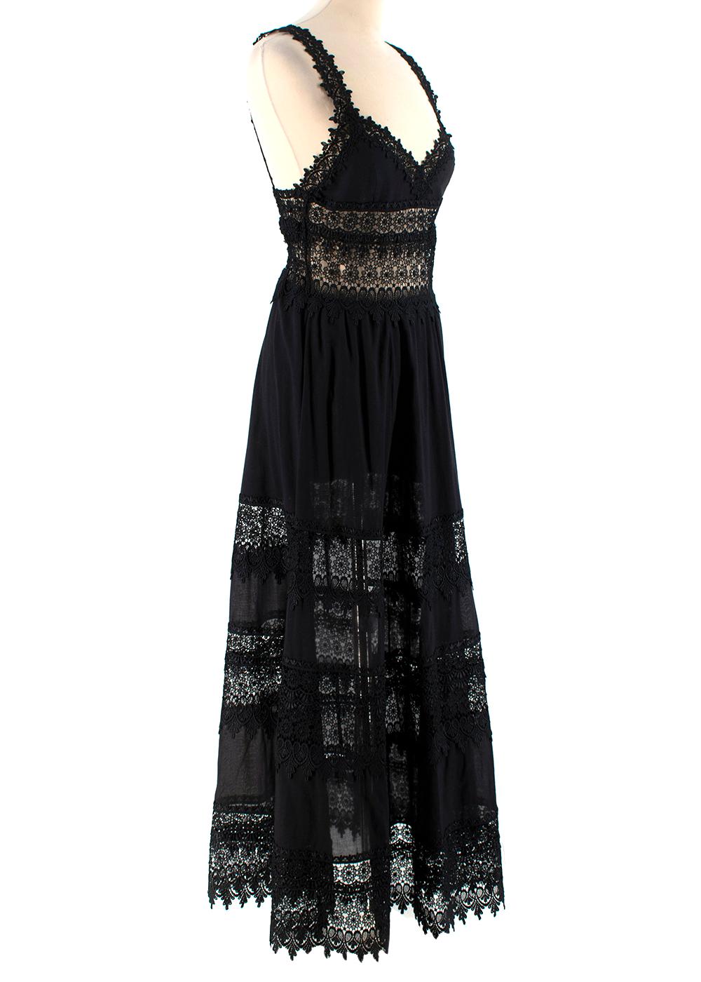 Charo Ruiz Sophia lace-trim maxi dress.

- Crafted from a black cotton blend
- Lace trim
- A line
- V-neck
- Spaghetti straps
- Ankle-length

Washing instructions:
Hand Wash

PLEASE NOTE, THESE ITEMS ARE PRE-OWNED AND MAY SHOW SIGNS OF BEING STORED