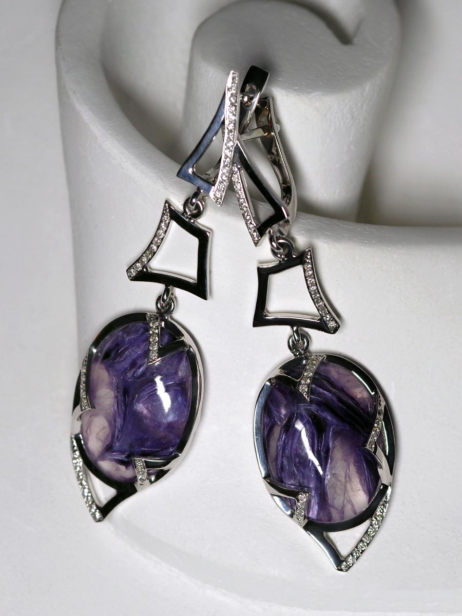 14K white gold rhodium plated earrings with natural Violet Charoite and diamonds
surrounded by 86 diamonds
charoite weight - 18.22 carats
charoite measurements - 0.16 х 0.59 x 0.79 in / 4 х 15 х 20 mm
diamonds weight - 0.386 carats
earrings length -