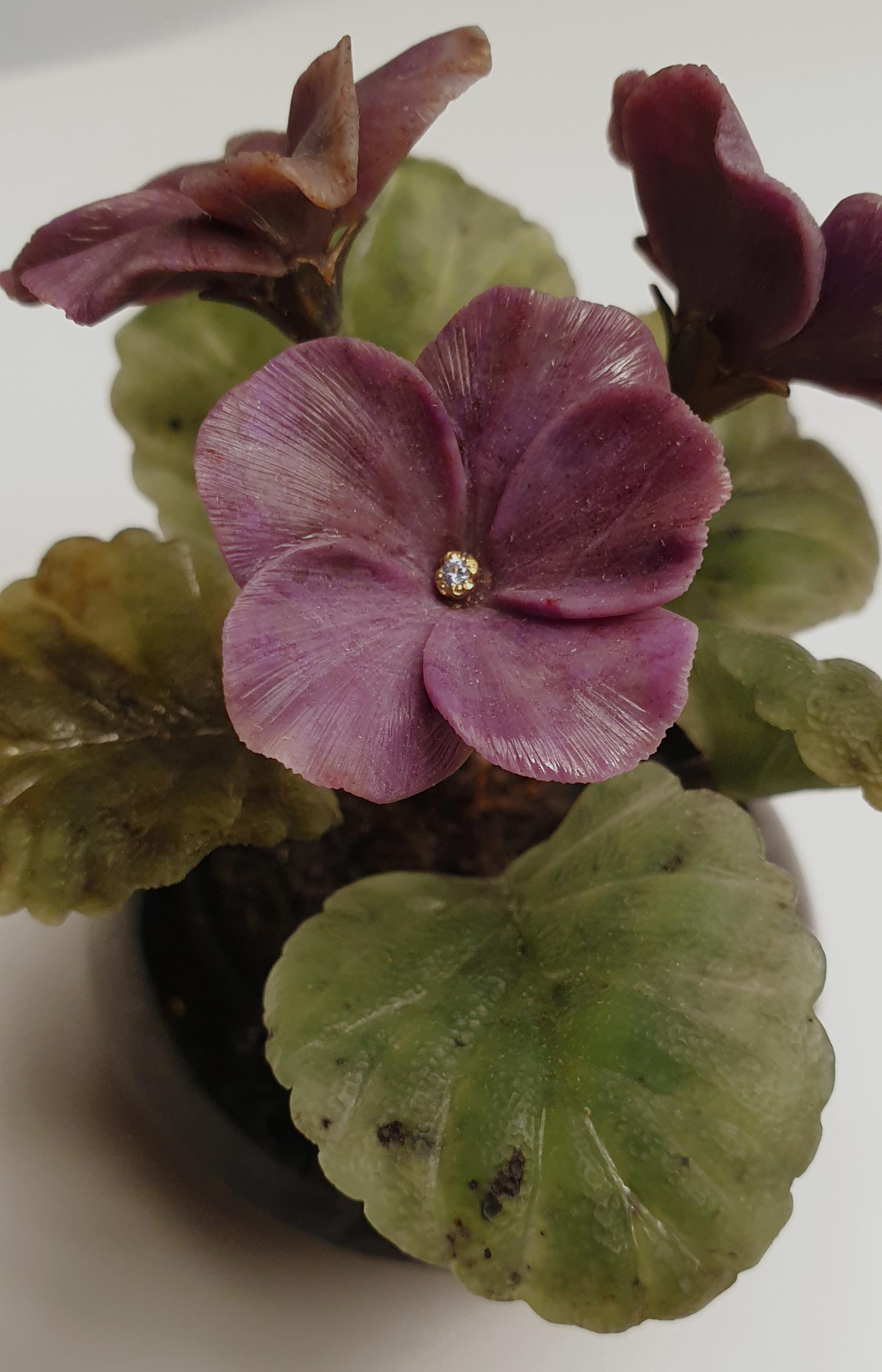 Sterling silver 22k, jade, charoite Violets sculpture
Precious objects in the form of floral sprays have a long history in Russia. The realistic violet petals are carved from charoite evoking the fine gradations found in nature.