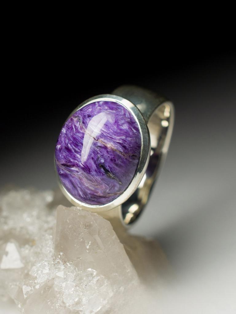 Silver ring with natural Charoite 
gemstone size is 0.35 х 0.47 х 0.59 in / 9 х 12 х 15 mm
gemstone weight - 10.8 carats
ring weight - 9.11 grams
ring size - 8.5 US