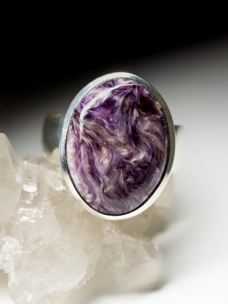 Silver ring with natural Charoite 
charoite measurements - 0.63 х 1.85 in / 6 х 14 х 20 mm
charoite weight - 9.6 carats
weight of the ring - 9.50 grams
ring size - 9 US
