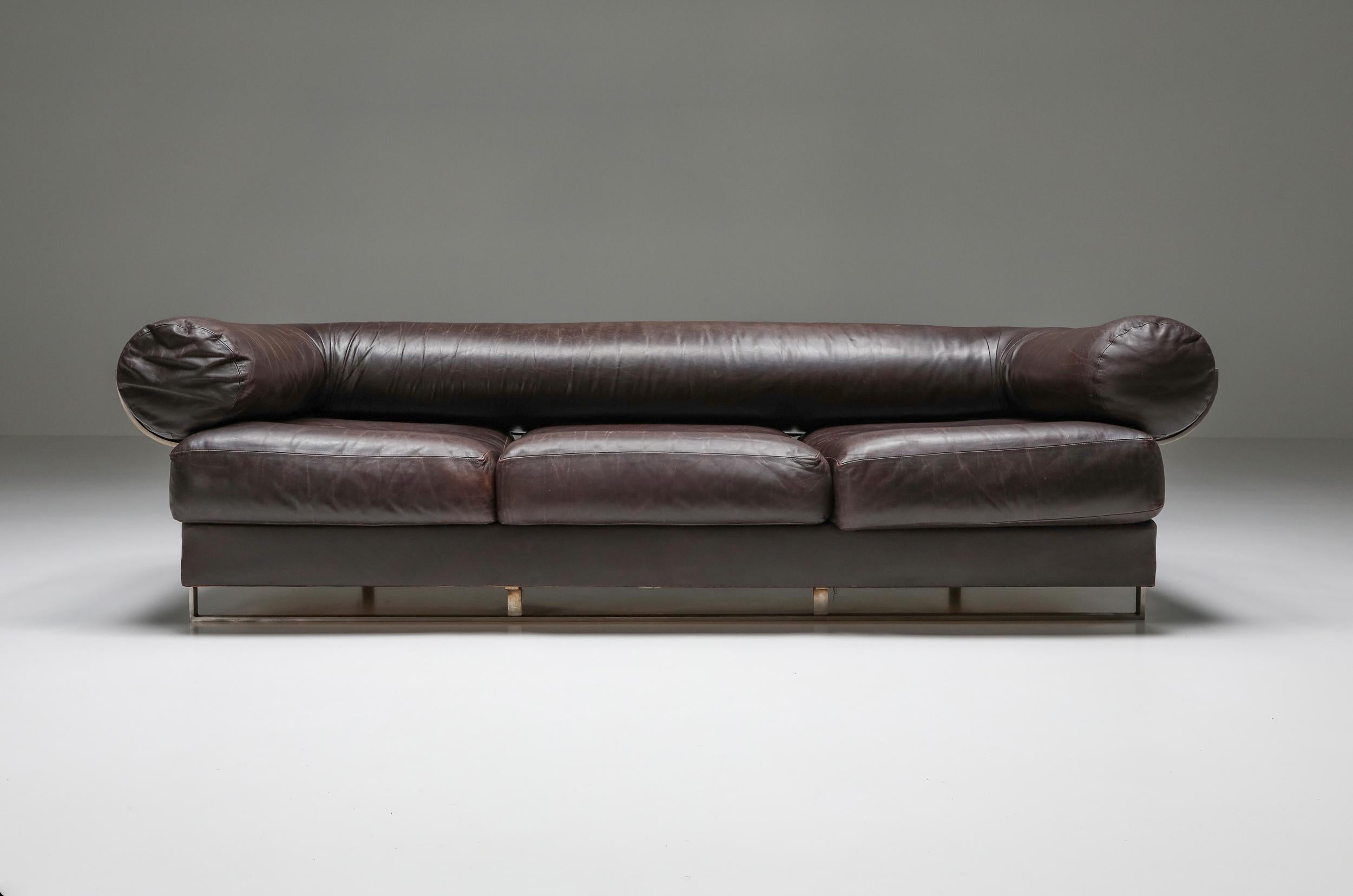 Jacques Charpentier 1960s brown leather sofa with stainless steel structure. Crafted with precision and style, this iconic piece showcases the perfect fusion of vintage charm and timeless sophistication. 