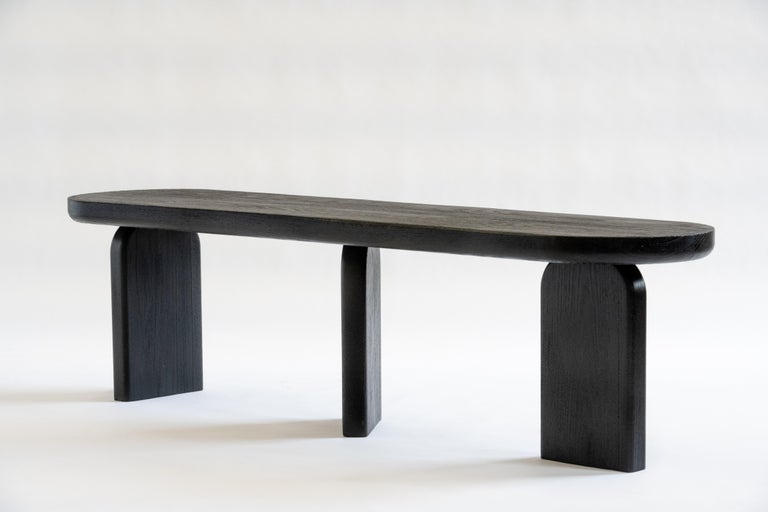 Constructed from solid oak, this sculptural bench is finished with a traditional technique referred to as Shou Sugi Bon. Japanese Joinery is placed throughout its seat for both form and function.

Custom dimensions available upon request.