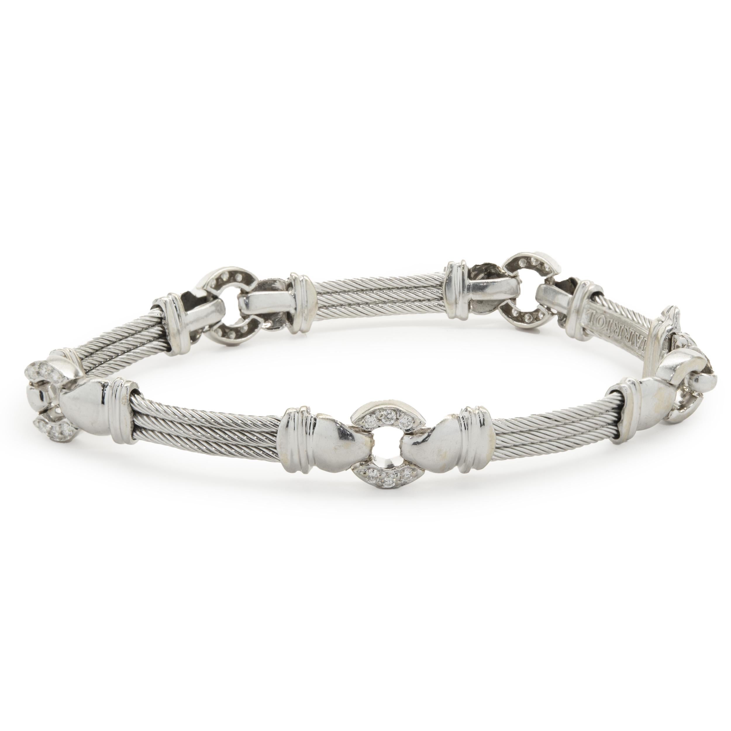 Designer: Charriol
Material: 18K white gold & stainless steel
Diamond: 24 round brilliant cut = .36cttw
Color: H
Clarity: SI1-2
Weight: 20.03 grams
Dimensions: bracelet measures 7-inches in length