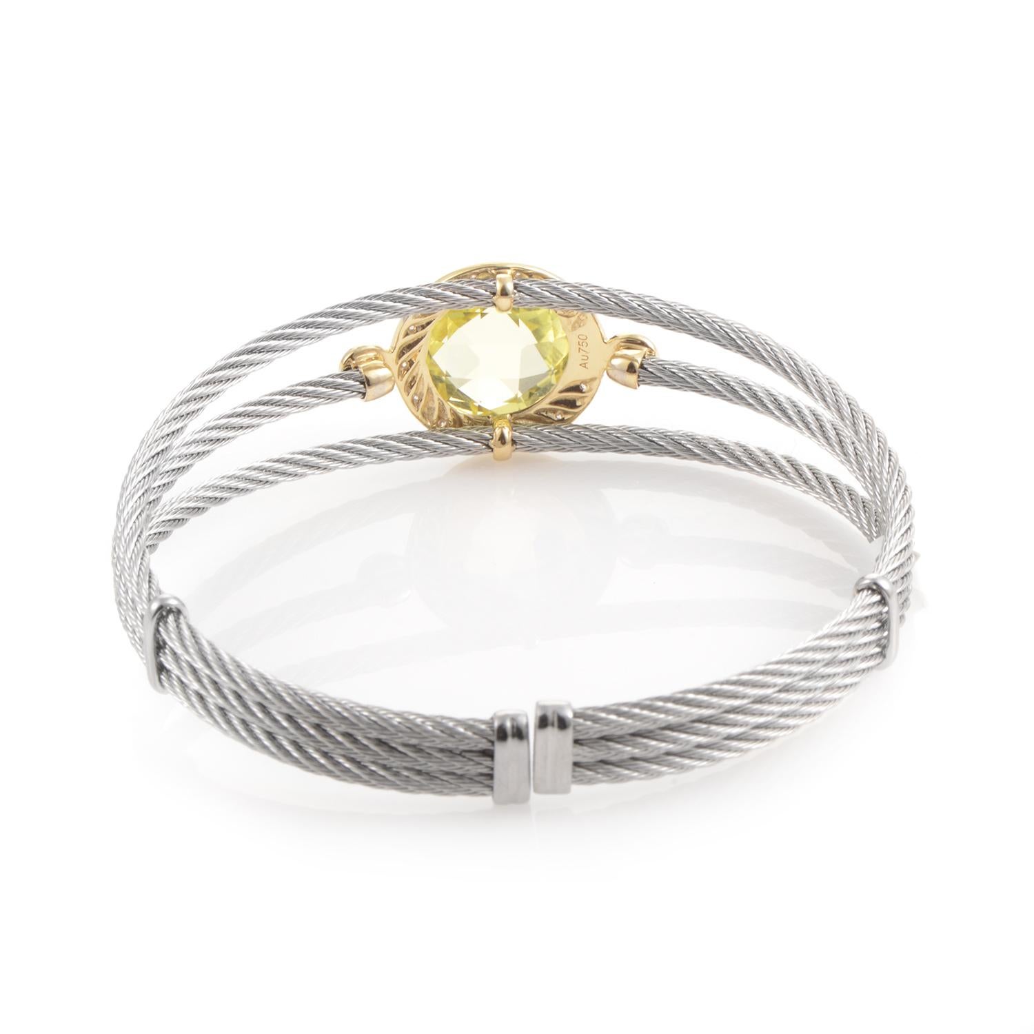 From Charriol's Celtic Classique Collection, this stainless steel Celtic Cable Bracelet boasts a round lemon citrine stone surrounded by .10ct white diamonds in an 18K yellow gold setting.
