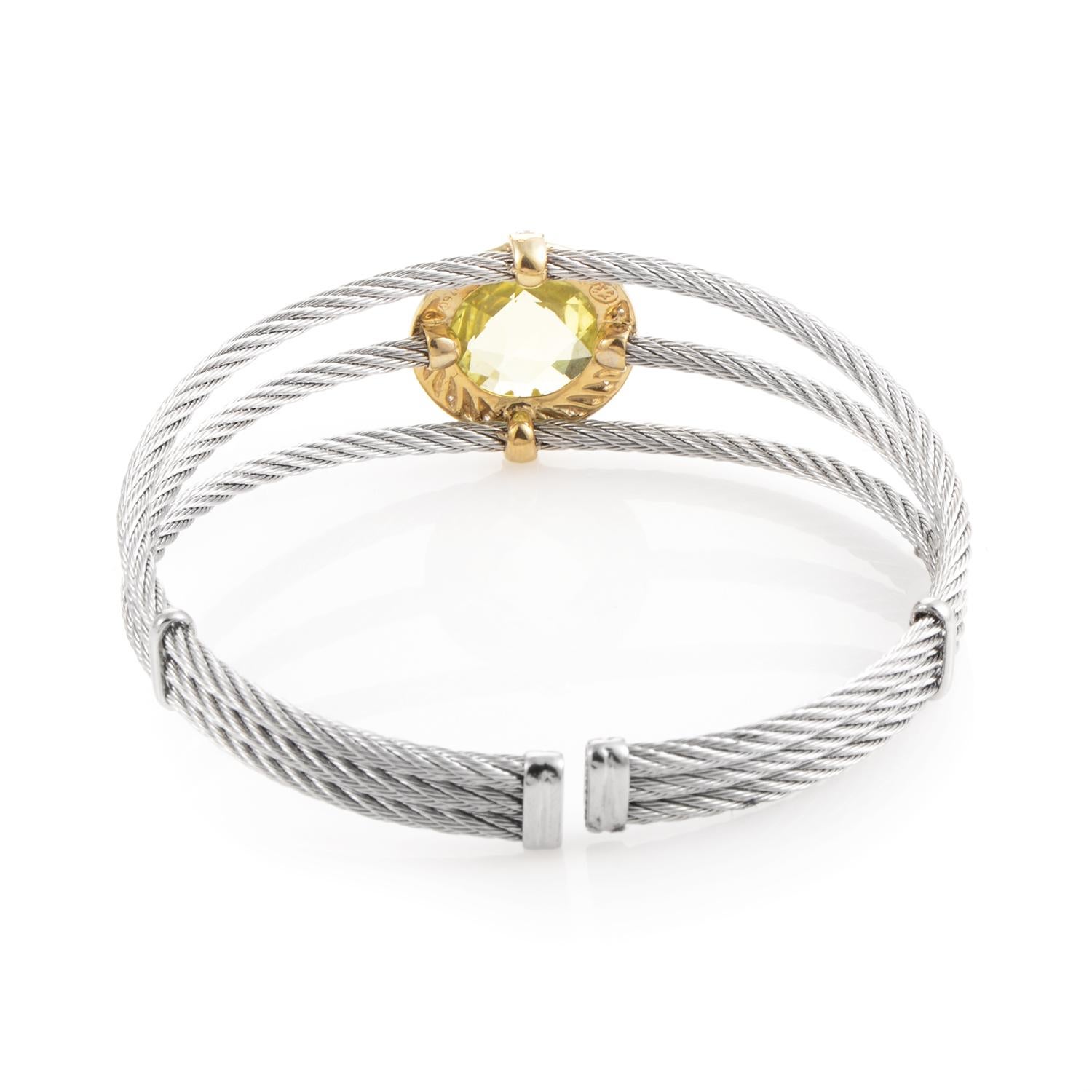 From Charriol's Celtic Classique Collection, this stainless steel Celtic Cable Bracelet boasts a round lemon citrine stone surrounded by .08ct white diamonds in an 18K yellow gold setting.
