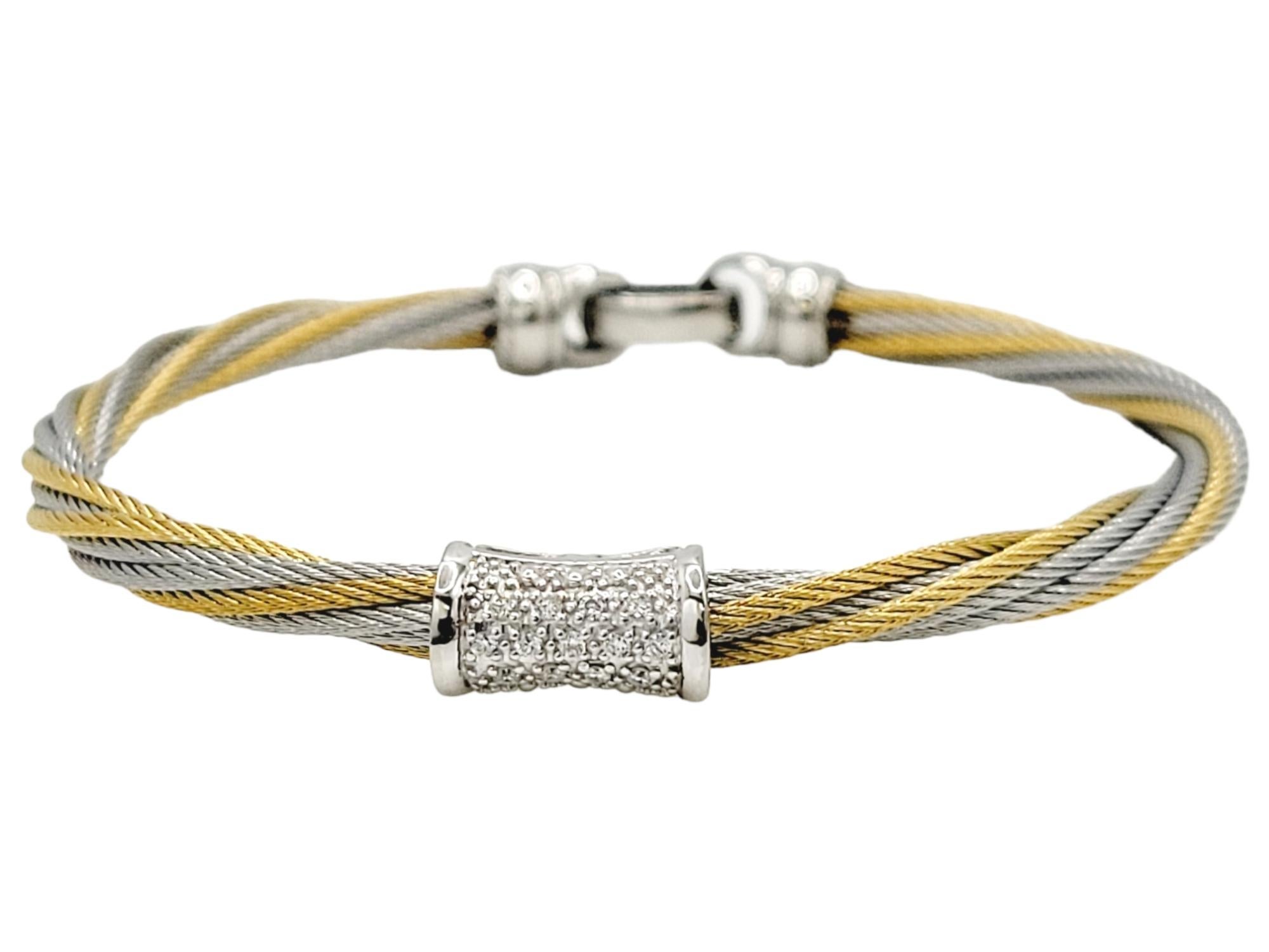 Introducing an exquisite Charriol Classique Bracelet, a testament to timeless elegance and impeccable craftsmanship. This stunning piece is expertly crafted with a blend of 18-karat yellow and white gold and durable stainless steel, creating a
