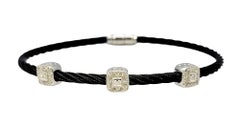 Pulsera Charriol Diamond Station de oro blanco de 18 quilates y acero inoxidable negro