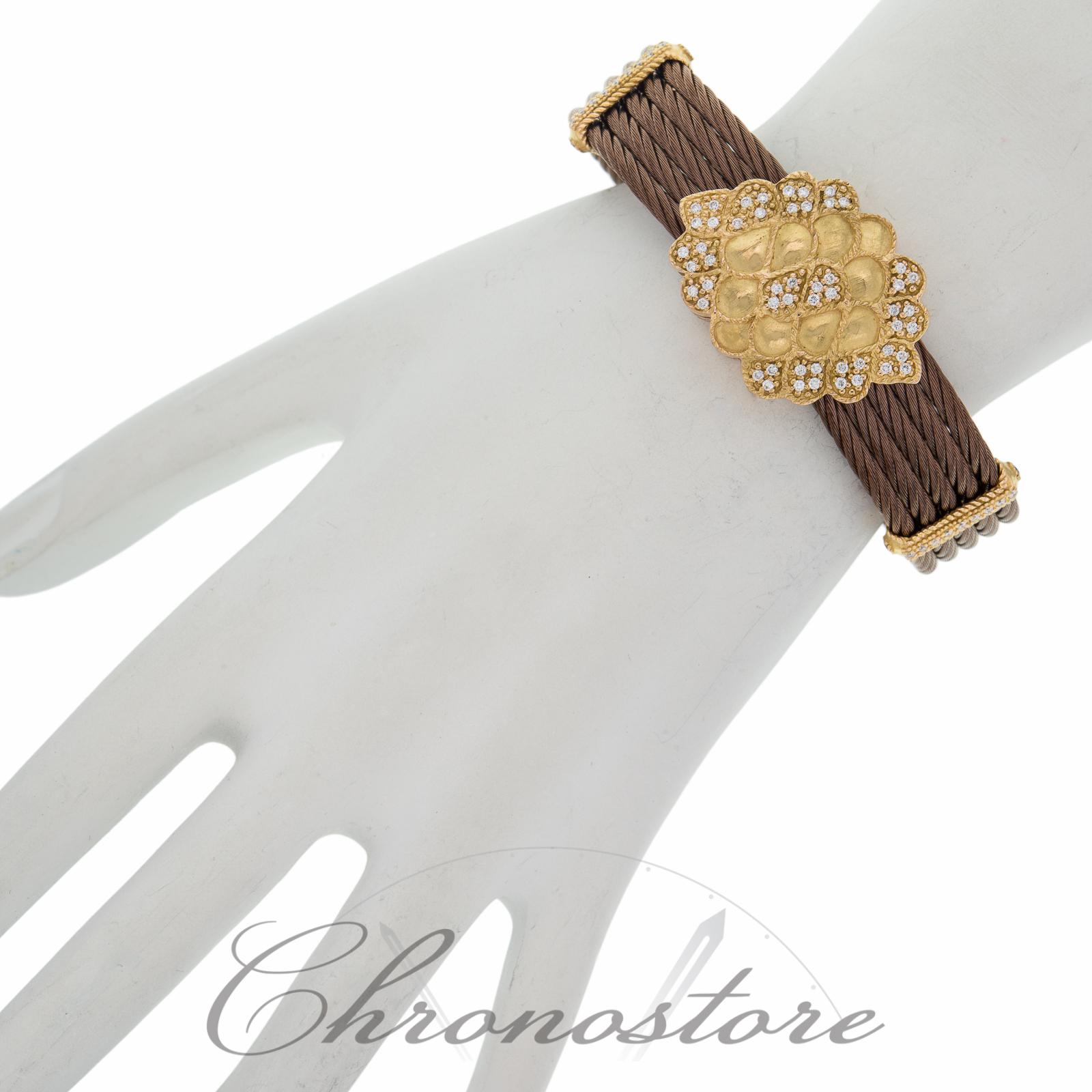 (4733)

Charriol Celtique Collection 18KT Gold & Bronze PVD Stainless Steel Cable Bangle Bracelet with .54ctw in Diamonds.

Charriol is a Swiss manufacturer of jewelry, watches, and other accessories. Charriol is one of the largest makers of