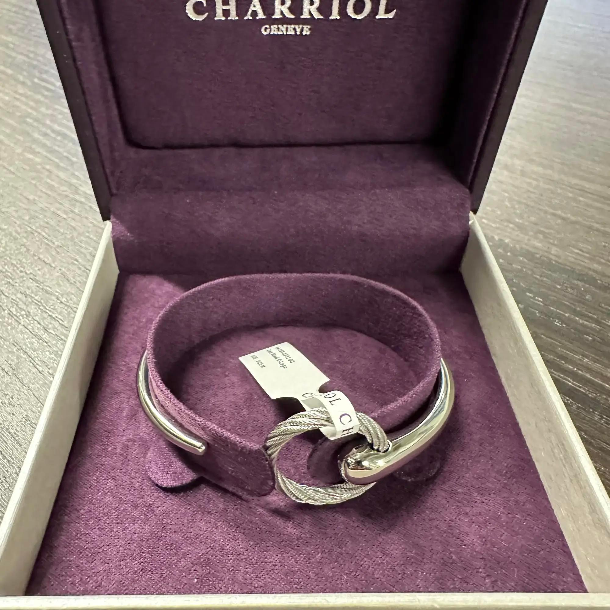 This gorgeous Charriol Infinity Zen open cuff bangle bracelet is a perfect addition to your everyday look. Super stackable and easy to wear, it features a stainless steel hinged bangle with a steel cable circular motif at one end. Size: Medium.