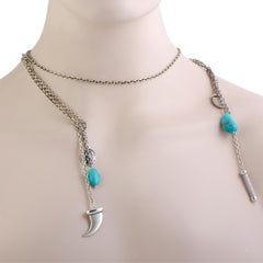 Collier Kucha en acier inoxydable avec deux pendentifs en turquoise et corne à bout ajouré de Charriol