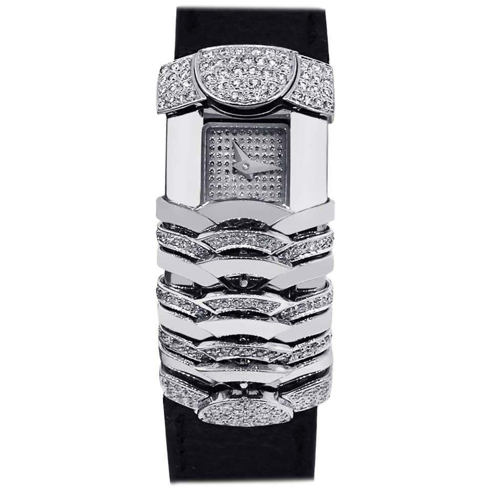 Charriol La Jolla Watch 18kt White Gold (22.7g) and diamonds (2.10 tcw) with White mother-of-pearl and diamond dial on a black satin strap.   
Brand: Charriol MPN: La Jolla Limited Edition No. 45 of 150 Model: LJG002 Case Material: Solid 18k white