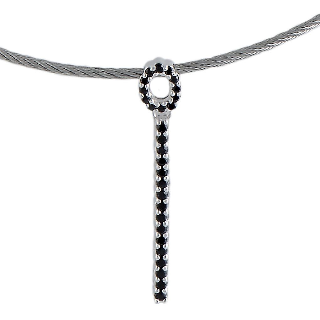 A vision of understated elegance, this exceptional “Laetitia” piece presented by Charriol offers an incredibly sublime look of utmost prestige and refinement. The necklace is made of stainless steel and it is decorated with eye-catching black