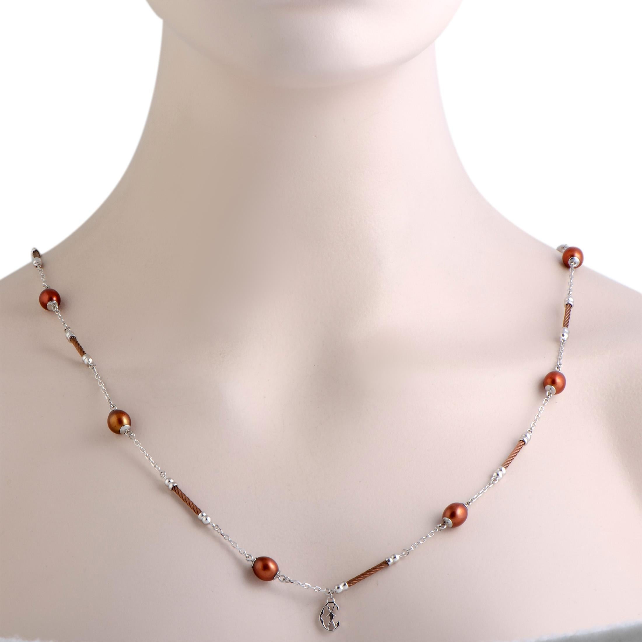 Add an incredibly attractive twist to your ensembles with this fascinating “Pearl” necklace from Charriol that is designed in a splendidly refined manner and beautifully decorated with gorgeous brown pearls. The necklace is made of stainless steel,
