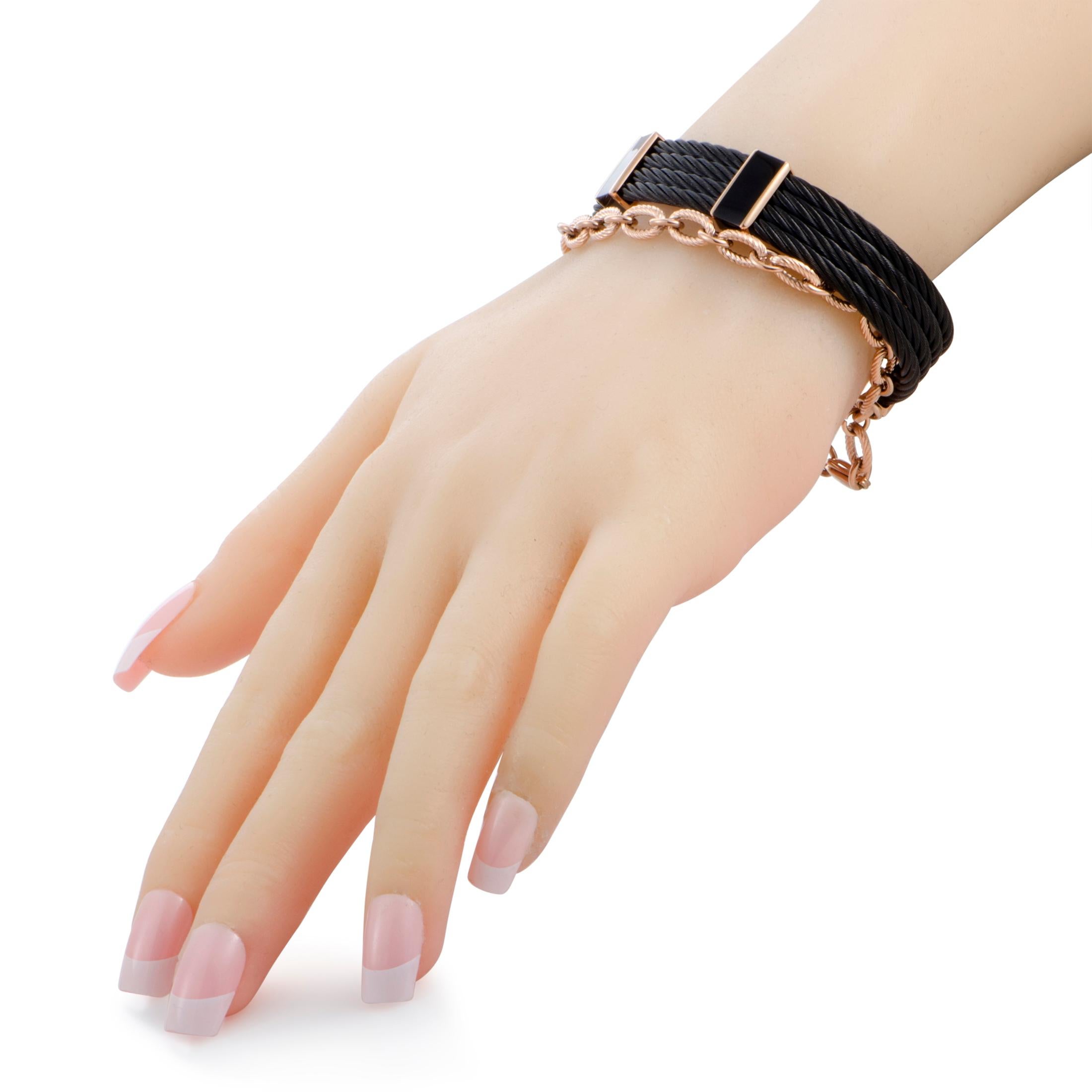 This exquisite “St. Tropez” bracelet from Charriol boasts a most compellingly imaginative design presented in stainless steel that is coated in attractive pink and black PVD. The bracelet is also decorated with black lacquer.