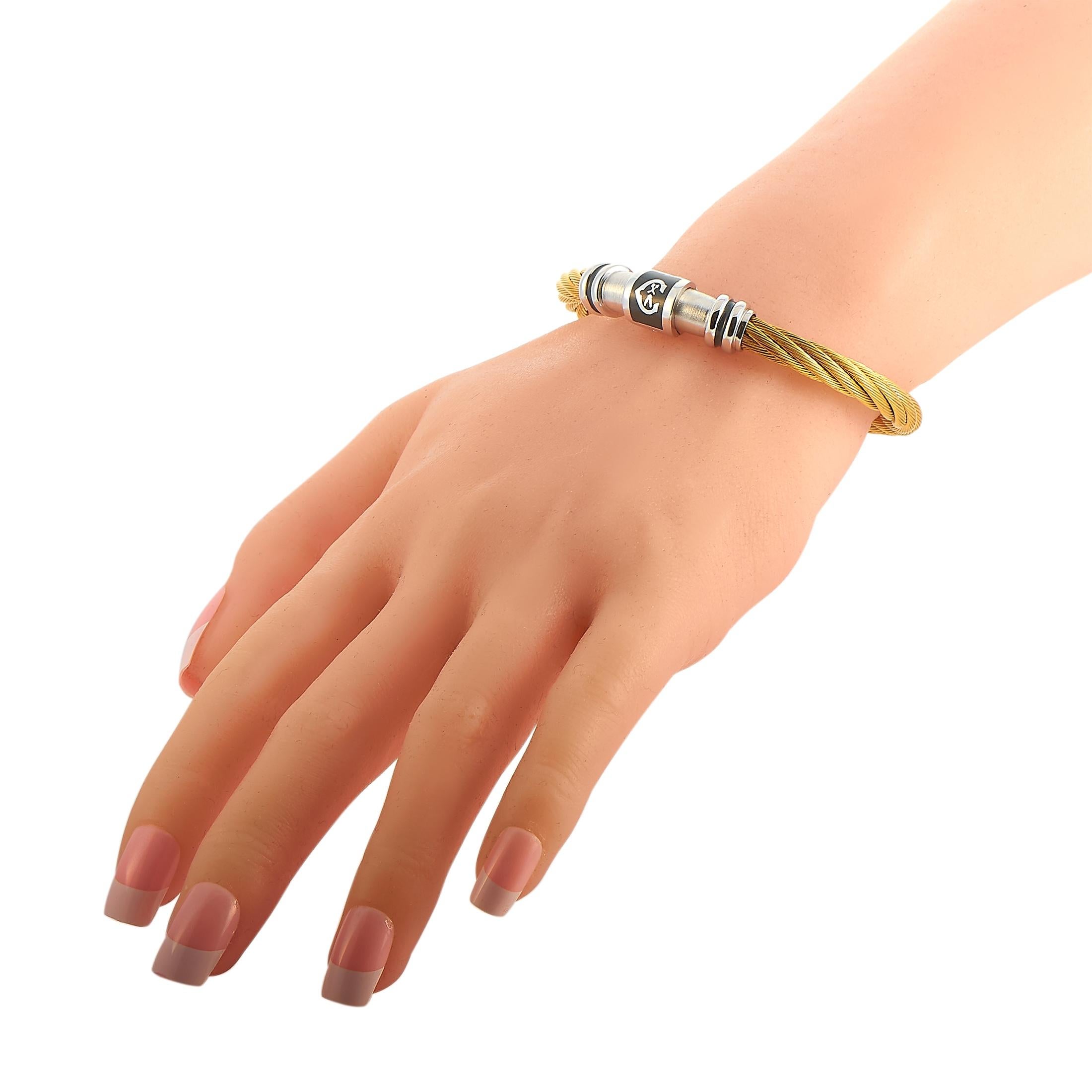This Charriol bracelet is made of stainless steel that is partially plated in yellow PVD. The bracelet measures 7.75” in length.
 
 Offered in brand new condition, this item includes the manufacturer’s box.
