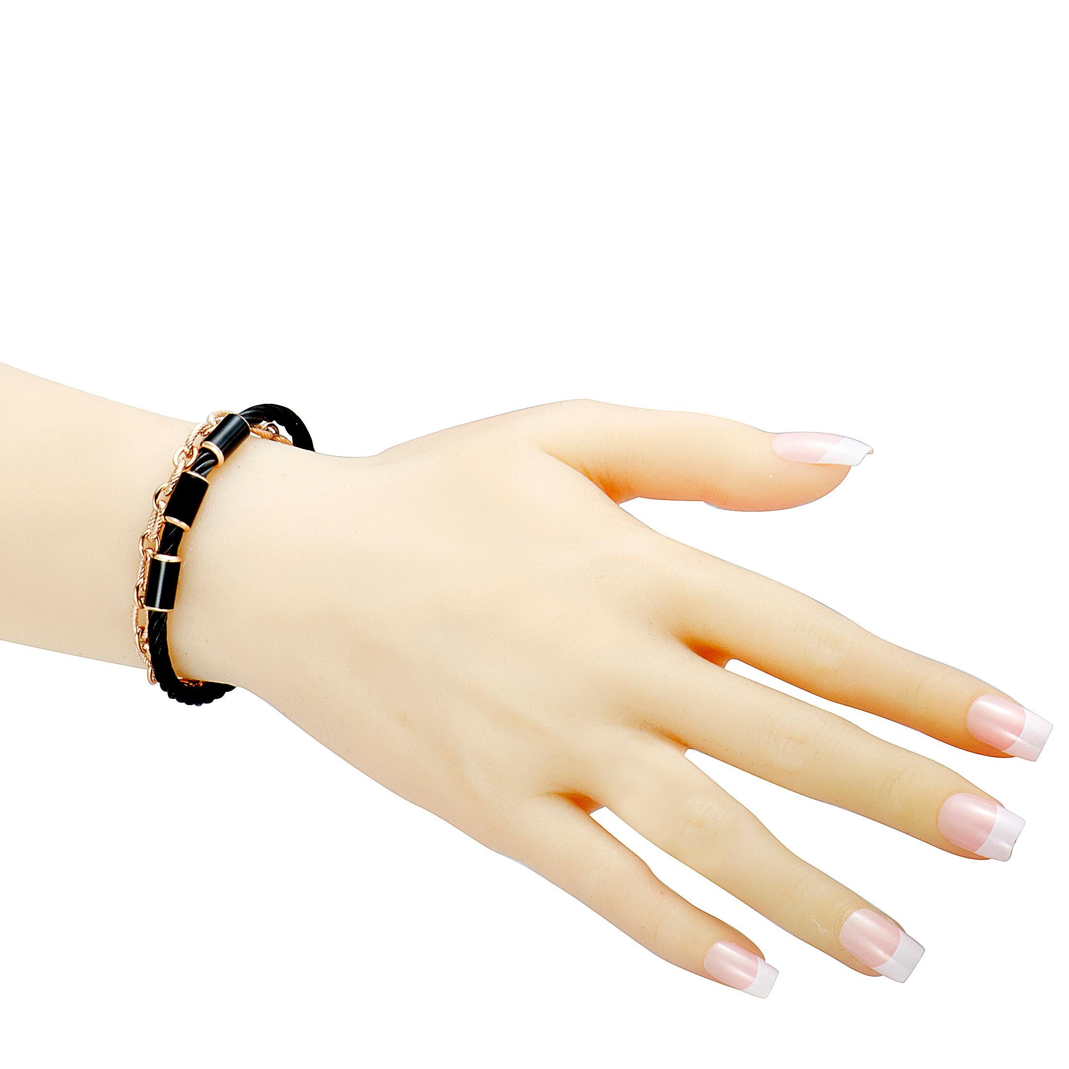 Boasting an attractive chain bracelet and a striking bangle bracelet that are beautifully made of pink and black PVD-coated stainless steel, this superb “St. Tropez” piece from Charriol offers an incredibly stylish look. The bangle bracelet is