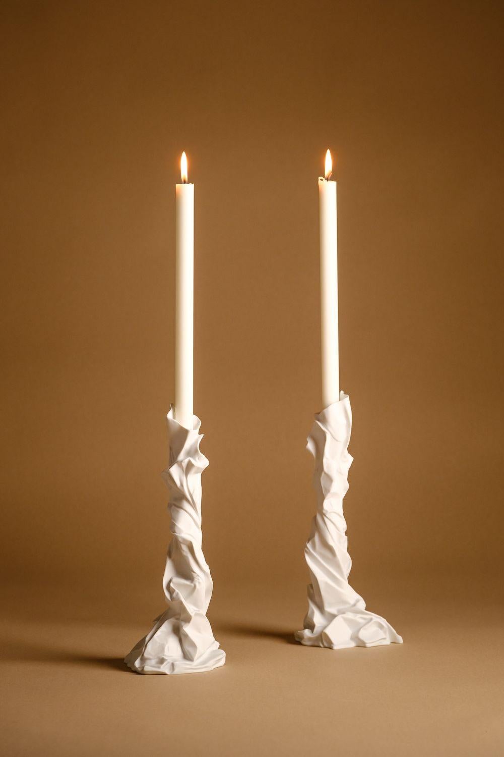 Charta candlestick by Studio Palatin
Dimensions: H 33.5 x D 16 cm
Materials: biscuit porcelain.

The artist’s inspiration for the Charta Alba Collection came from a series of sculptures formed from brown wrapping paper salvaged from an Amazon