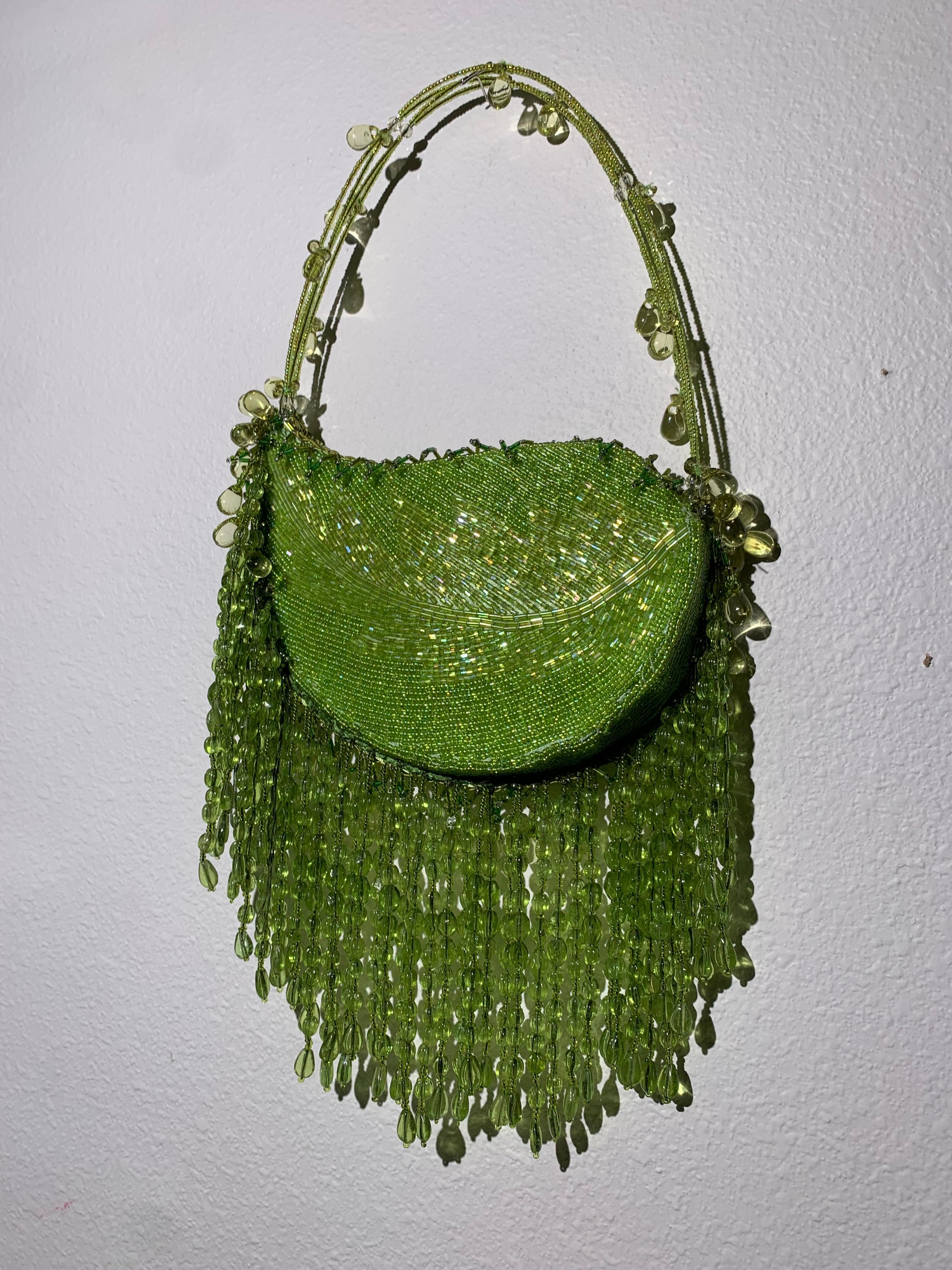 Chartreuse Bugle-Beaded Shoulder Bag w/ Exquisite Glass Beaded Fringe: The shoulder strap is wire-strung beadwork and is long enough for a shoulder bag. Body of bag is completely covered in bugle beads with a heavy teardrop glass bead fringe.