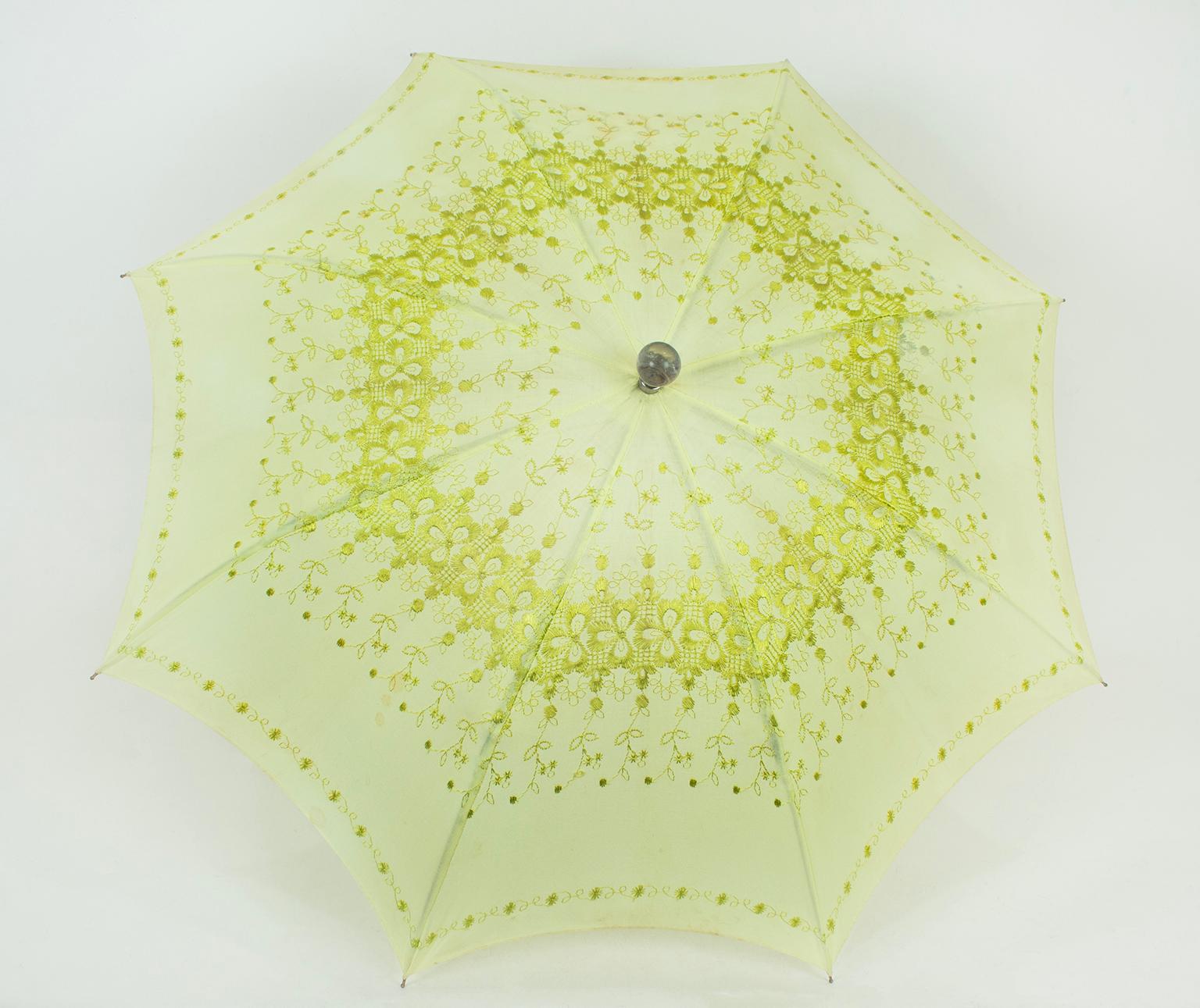 Though this umbrella was likely a part of a mid-century ensemble complete with matching day dress and shoes, the parasol itself is a prize. In cheerful soft lime chartreuse cotton, it straddles both Victorian and modern eras thanks to its delicate