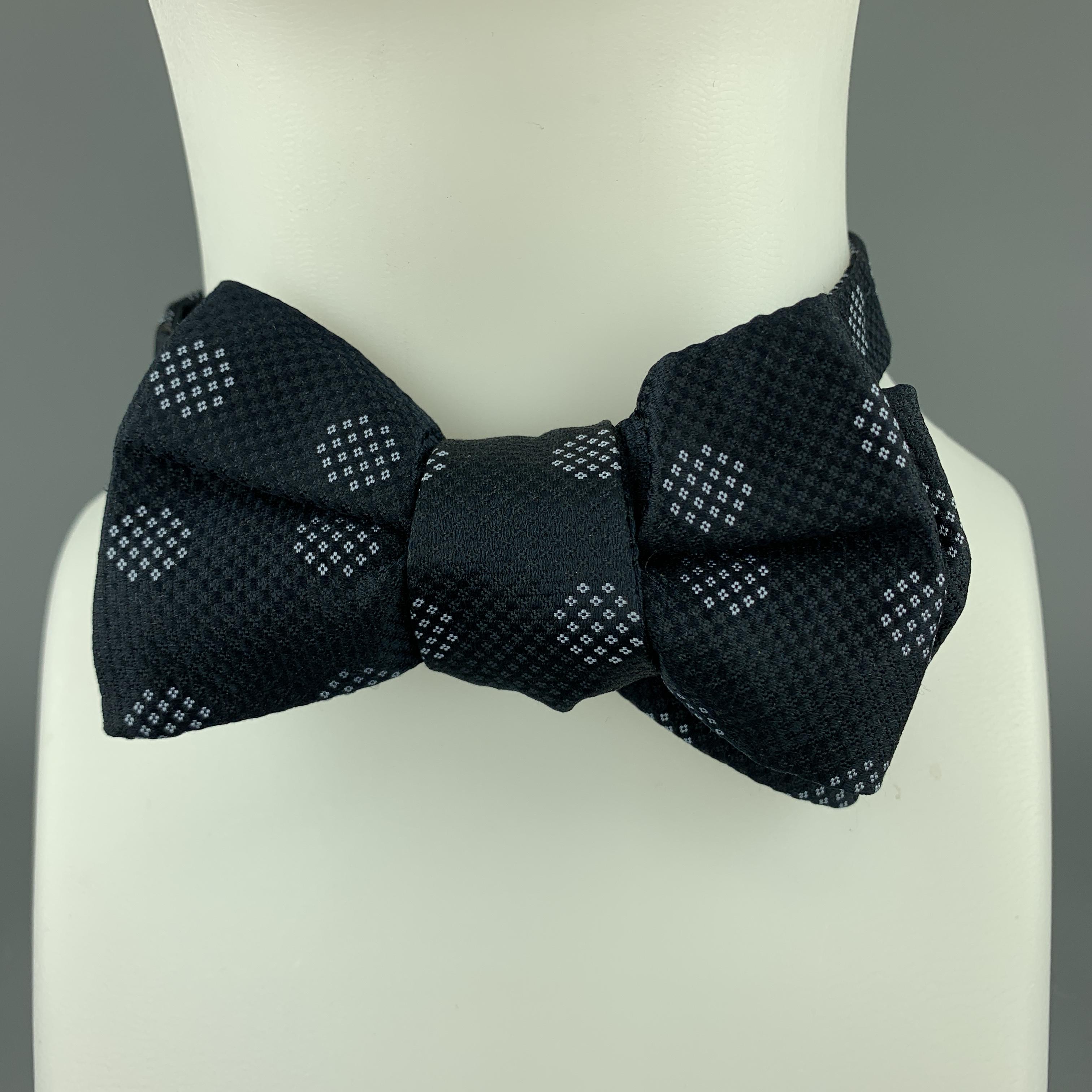 black tie with white spots