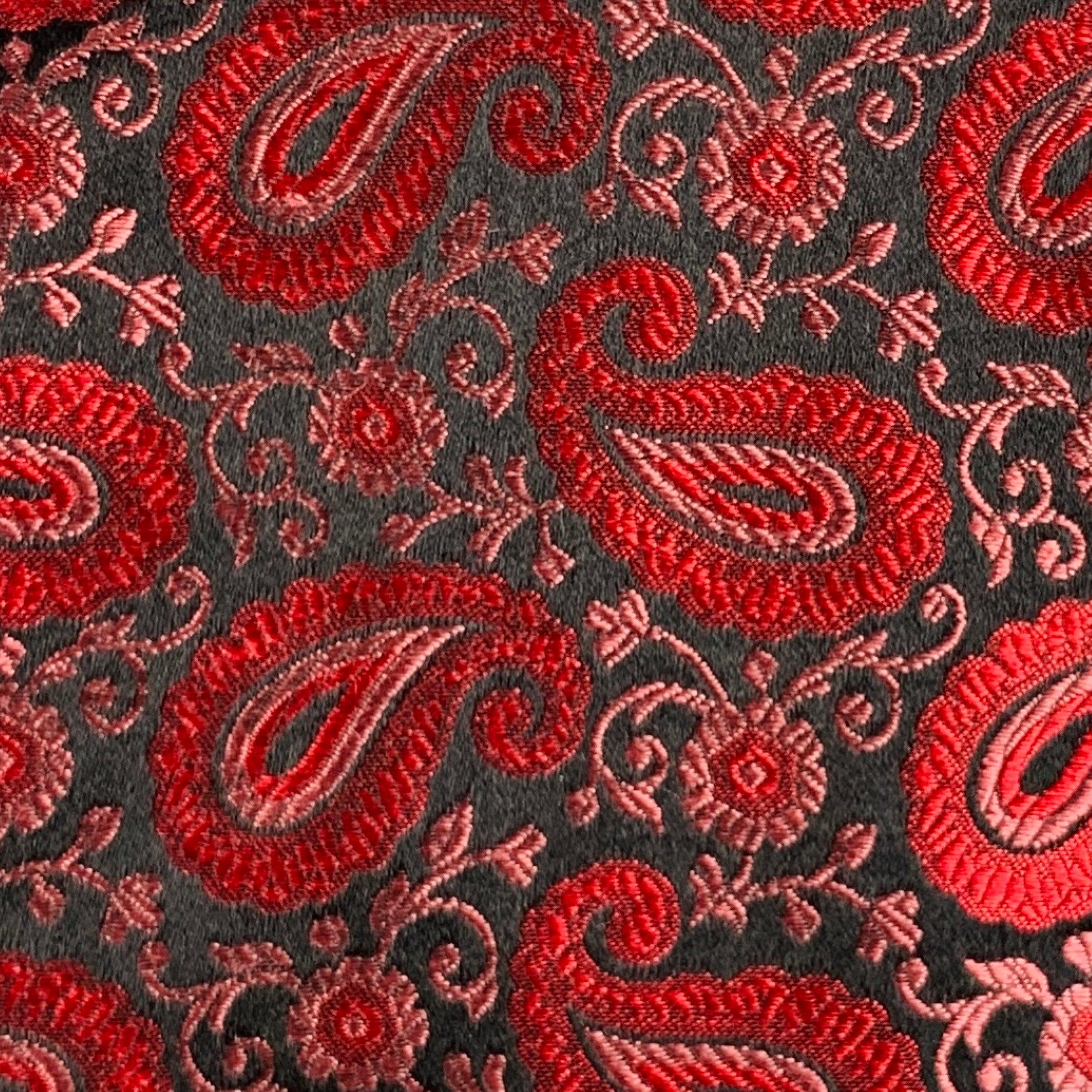 CHARVET vest
in a
burgundy and black silk fabric featuring paisley jacquard pattern, two pockets, and button closure. Made in France.Excellent Pre-Owned Condition. 

Marked:   L 

Measurements: 
 
Shoulder: 13 inches Chest: 41 inches Length: 22