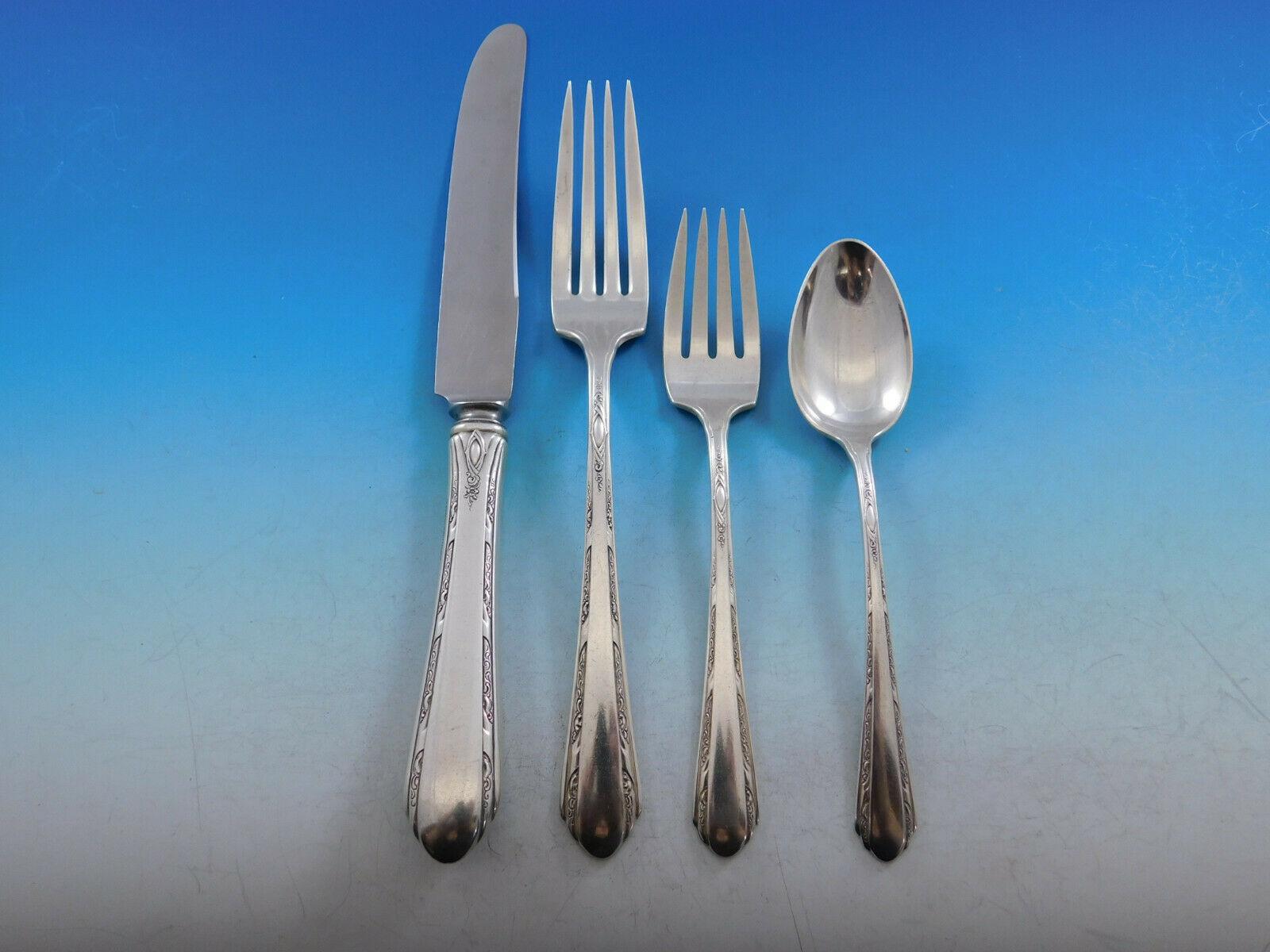 Dinner size chased Diana by Towle circa 1930s sterling silver flatware set, 50 pieces. This set includes:

6 dinner size knives, 9 5/8