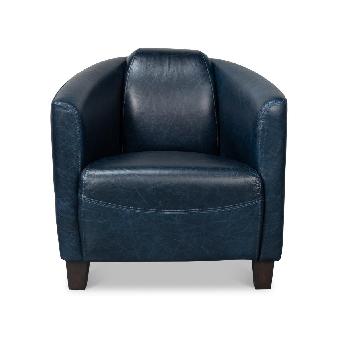 Crafted of luxurious top-grain leather in a wonderful blue hue, this stylish and comfortable chair is perfect for your den, library, or living room.
Color variation is common and acceptable on vintage leather.
Dimensions: 28
