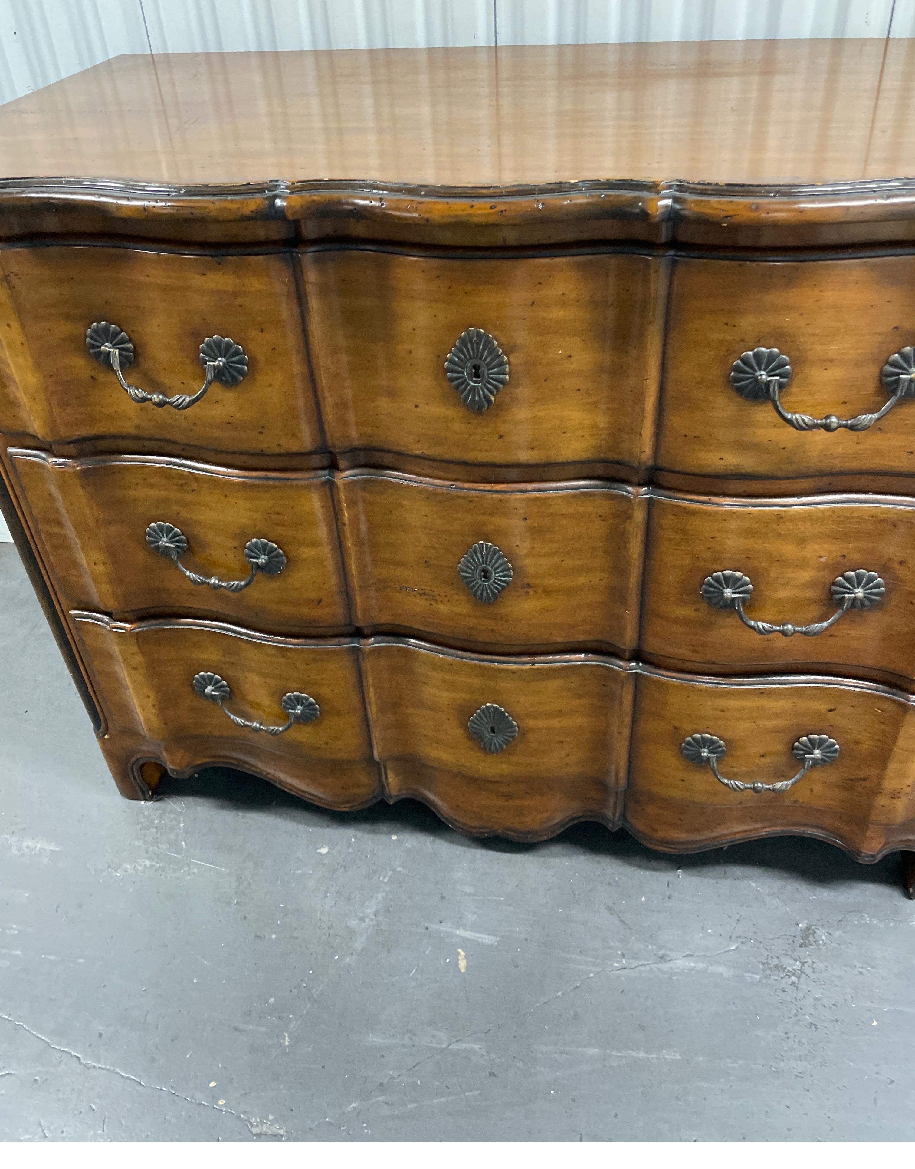 Vintage Country French style Commode by Theodore Alexander. An 18th Century hand made reproduction with three large drawers.