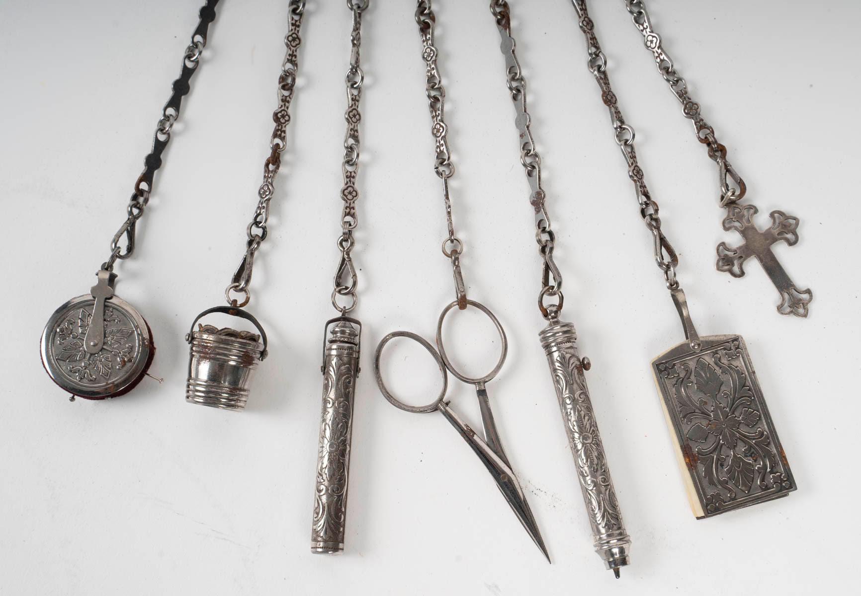 Chatelaine from the early 20th century.

An early 20th century silver-plated chatelaine.
H: 36cm, W: 5cm, D: 2cm