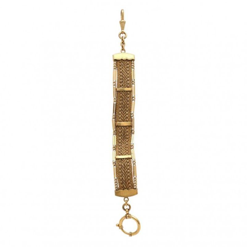 Chatelaine made of braided hair, metal gold -plated, 19th century, L: approx. 21 cm, slight traces of age. <br> <br> Chatelaine, Hair, Metal Goldplated, 19th cent., L: c. 21 cm, Slightly Age-Related Signs of Wear.
