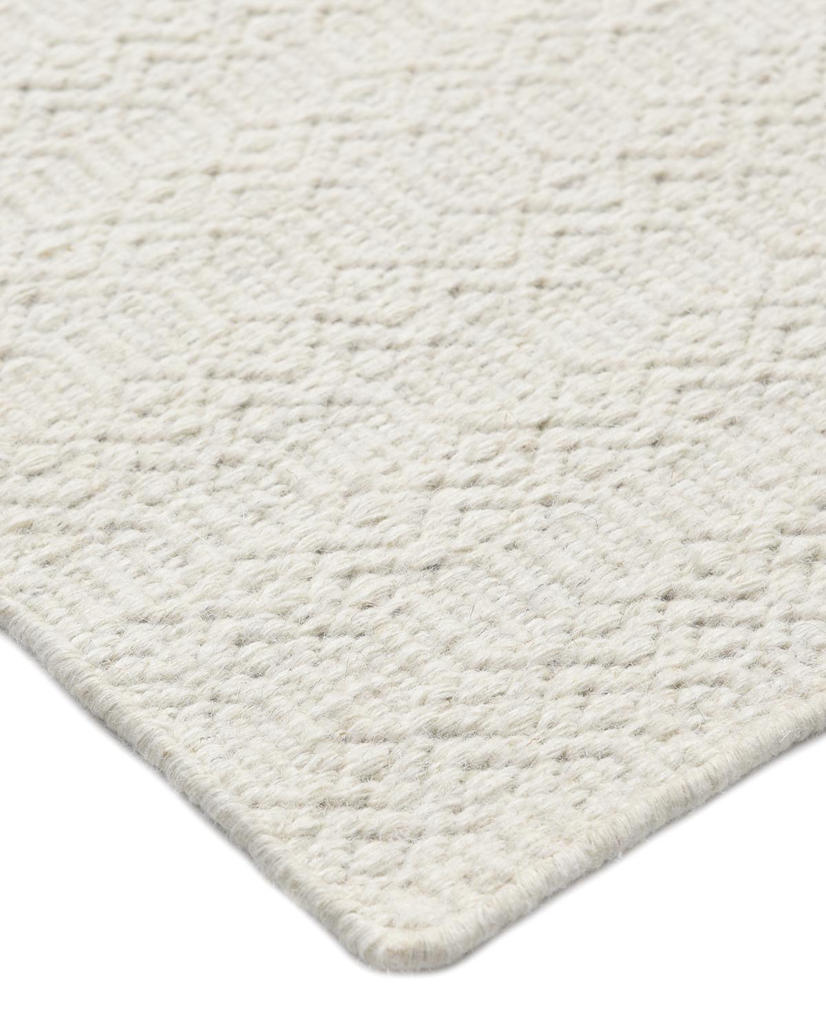 Color: Ivory. Made In: India. 80% Wool, 20% Cotton. Durable and low-maintenance, flatweave rugs are especially popular for high-traffic rooms and in households with children and pets. The handwoven rugs in the Flatweave collection are beautiful as
