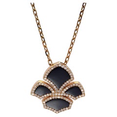 Collier avec pendentif Chatila en onyx et diamants, or 18 carats
