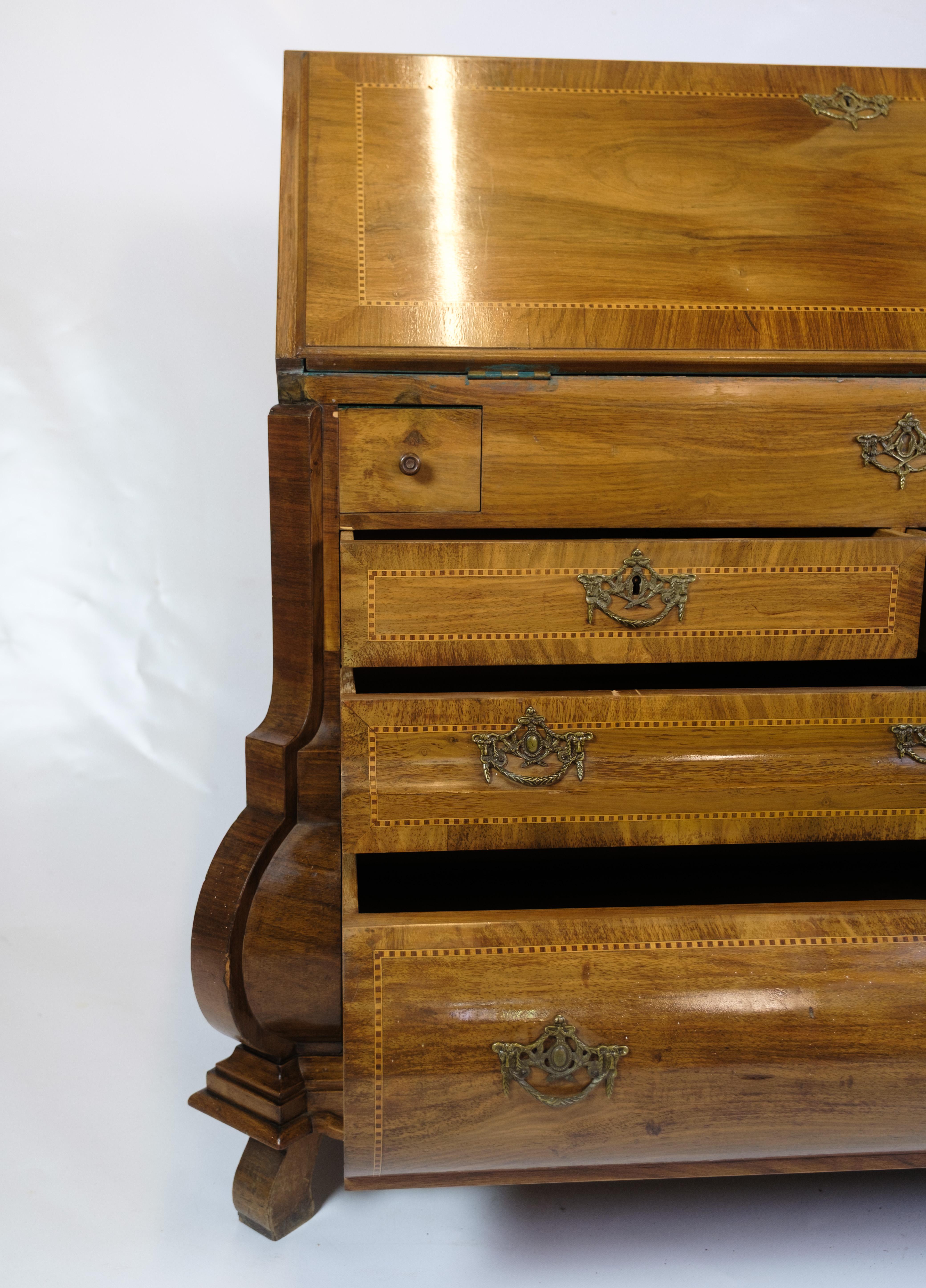 Chatol with four drawers, inlay and with interior painting. The chatol is made of light walnut and manufactured by the furniture factory Lysberg & Hansen, from around the year 1890.

Dimensions: H:100cm W:100cm D:51cm