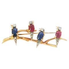 Chatting on the Branch! 18K Gold Ruby, Sapphire, and Diamond Four-Bird Brooch