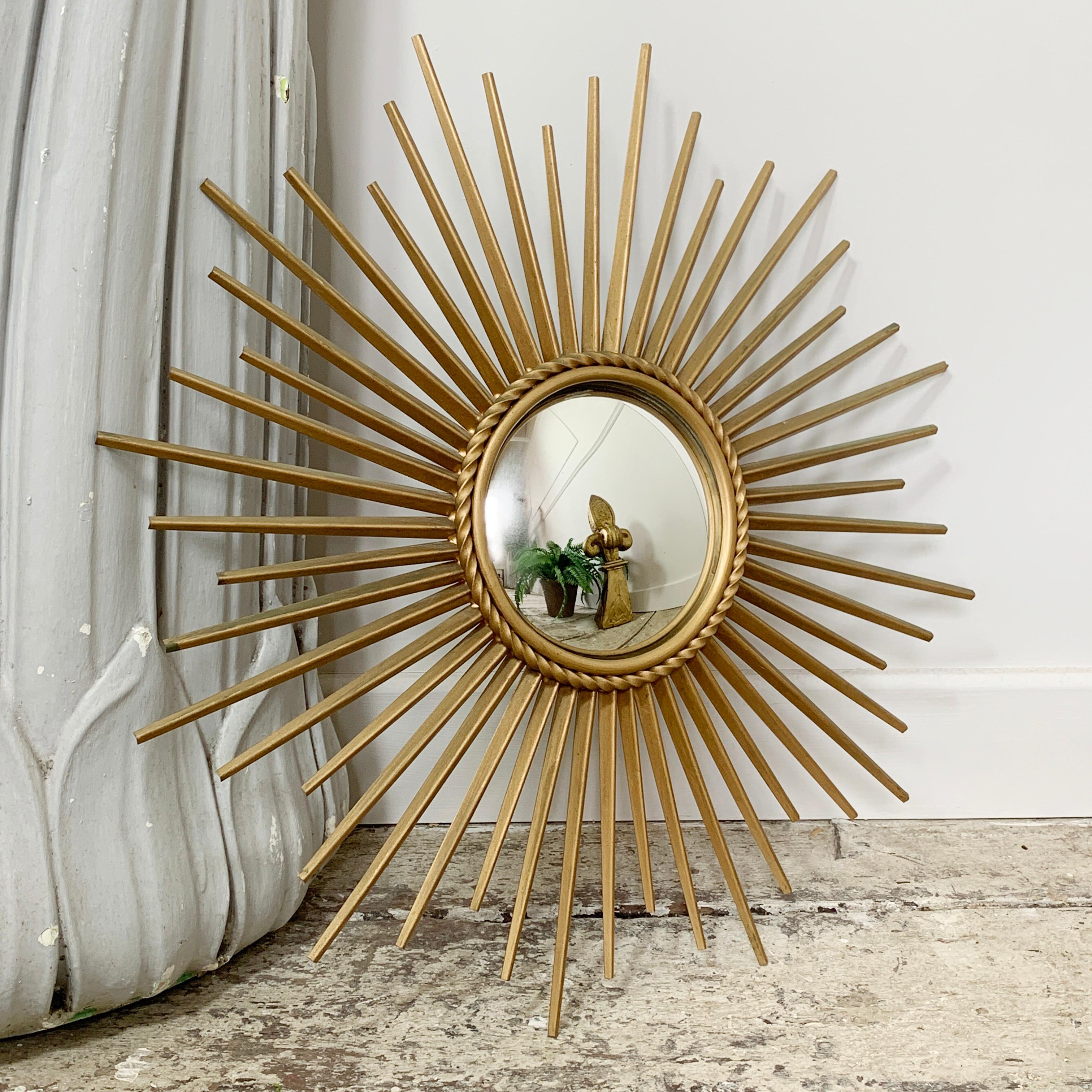 Chaty Vallauris sunburst mirror, original sorciere convex glass

France, 1950s

Fully Stamped on the reverse 'chaty vallauris’

Excellent condition for age and a great size

Measures: Width 51 cm, depth 3 cm, mirror 14 cm.