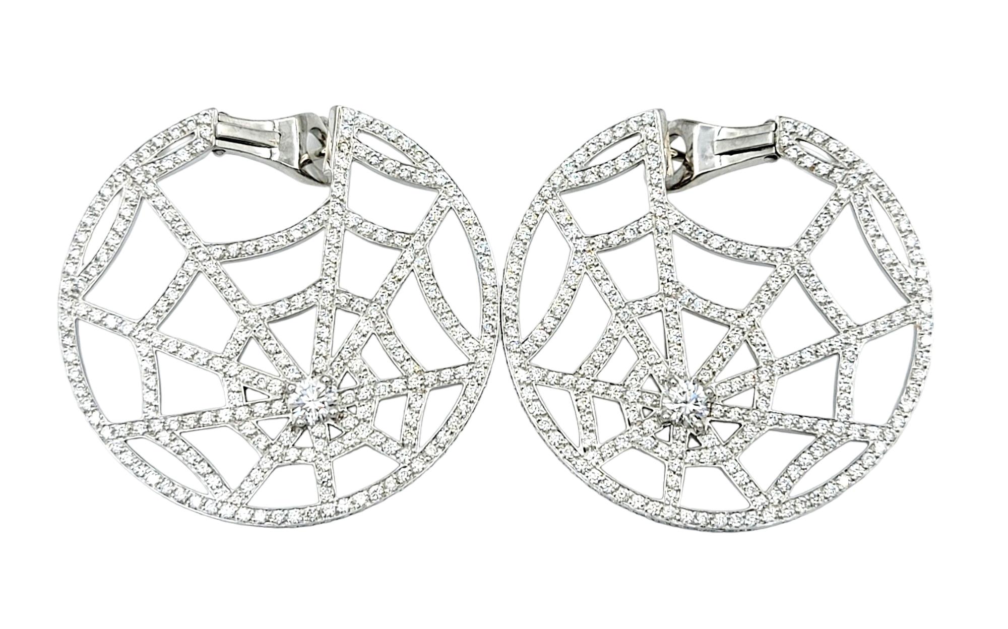 These captivating and unique Chaumet diamond spiderweb earrings are a truly dazzling pair that embody sophistication and artistry. Crafted with meticulous attention to detail, these fabulous designer earrings showcase Chaumet's renowned