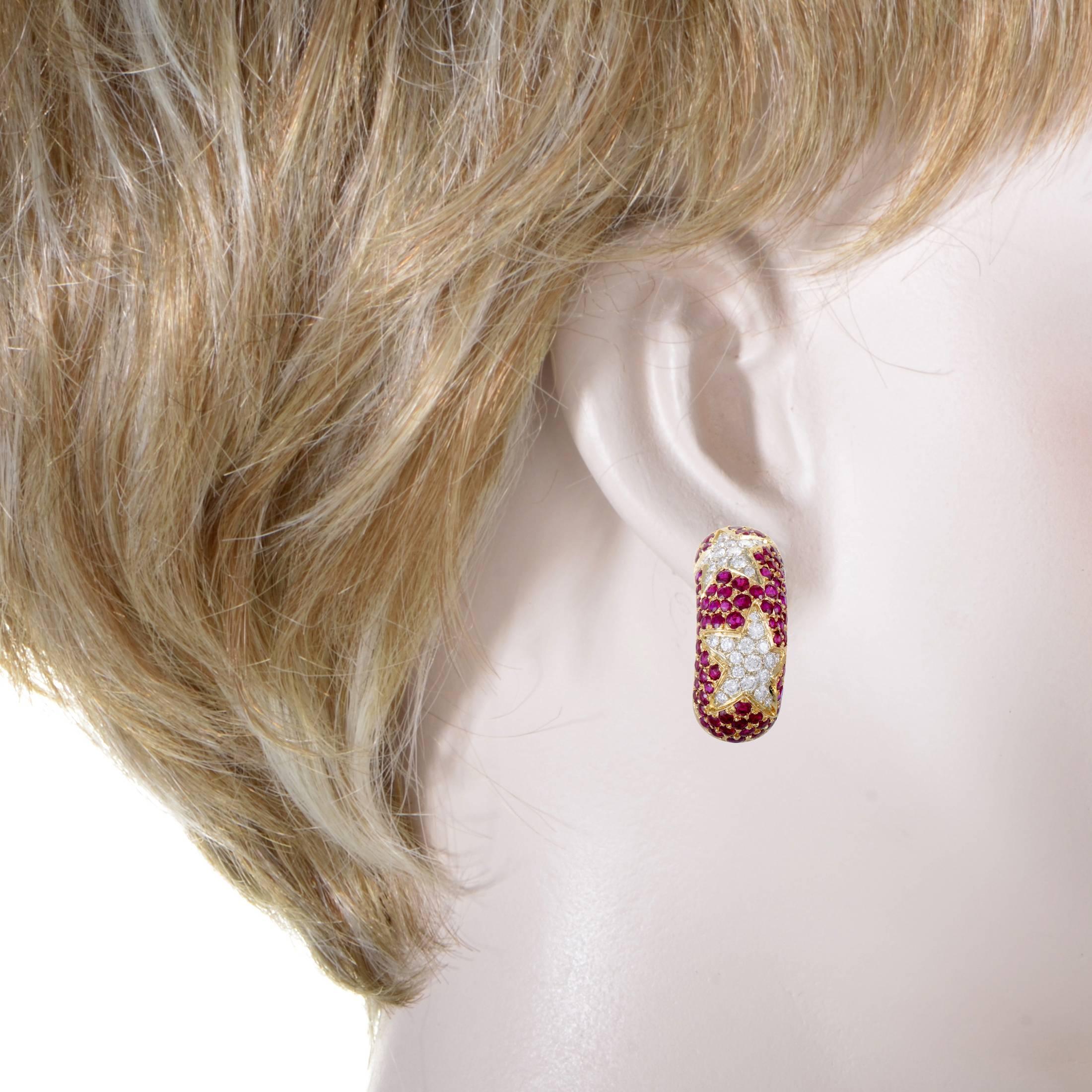 Set amidst fabulous seas of romantic rubies which weigh in total 3.90 carats, glistening diamonds amounting to 1.80 carats are arranged in the compelling form of stars in these spellbinding 18K yellow gold earrings from Chaumet.