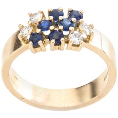 Chaumet 18 Karat Yellow Gold Ring with Blue Sapphires and Diamonds