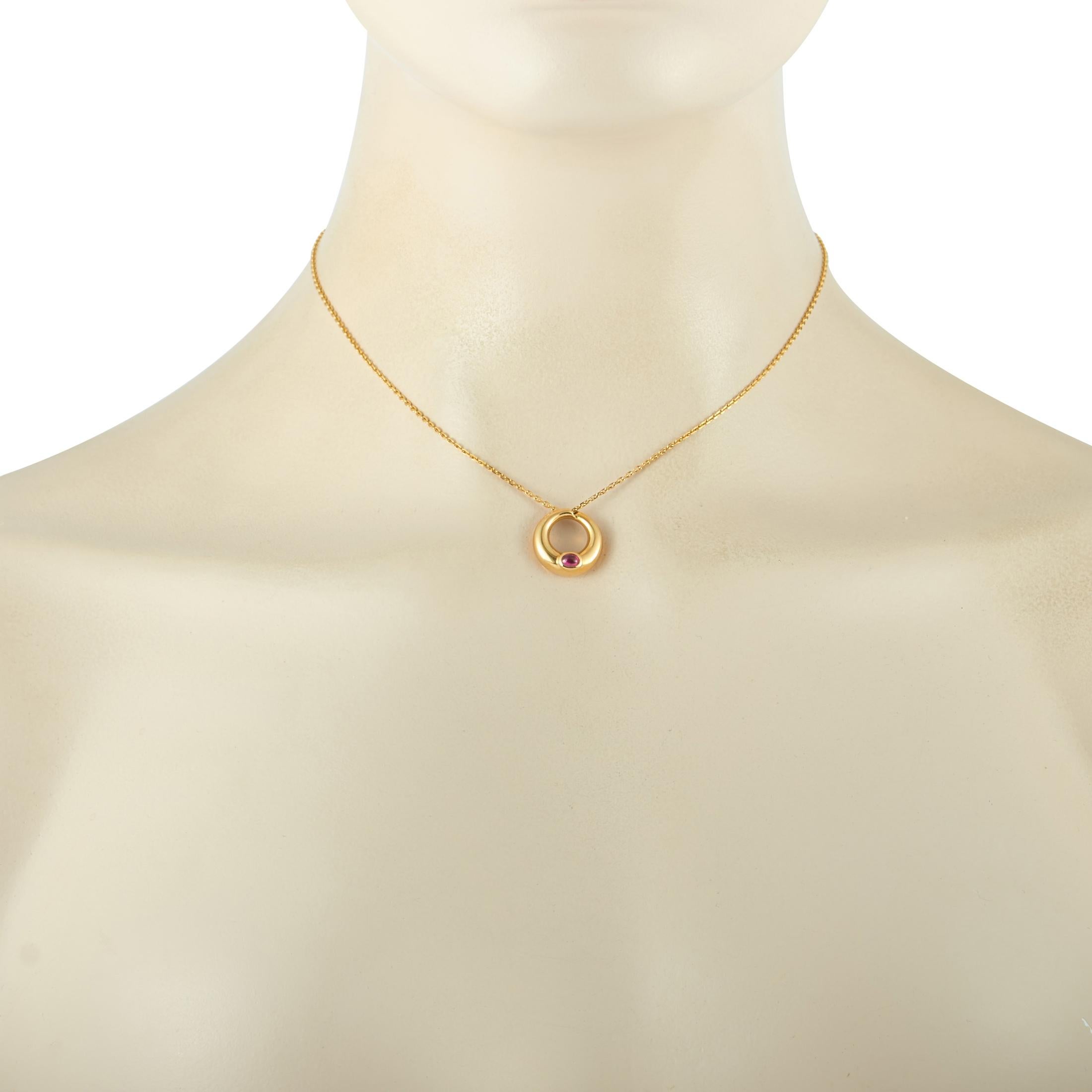 This Chaumet necklace is made of 18K yellow gold and embellished with a ruby. The necklace weighs 6.5 grams and boasts a 15” chain and a pendant that measures 0.62” in length and 0.62” in width.
 
 Offered in estate condition, this jewelry piece