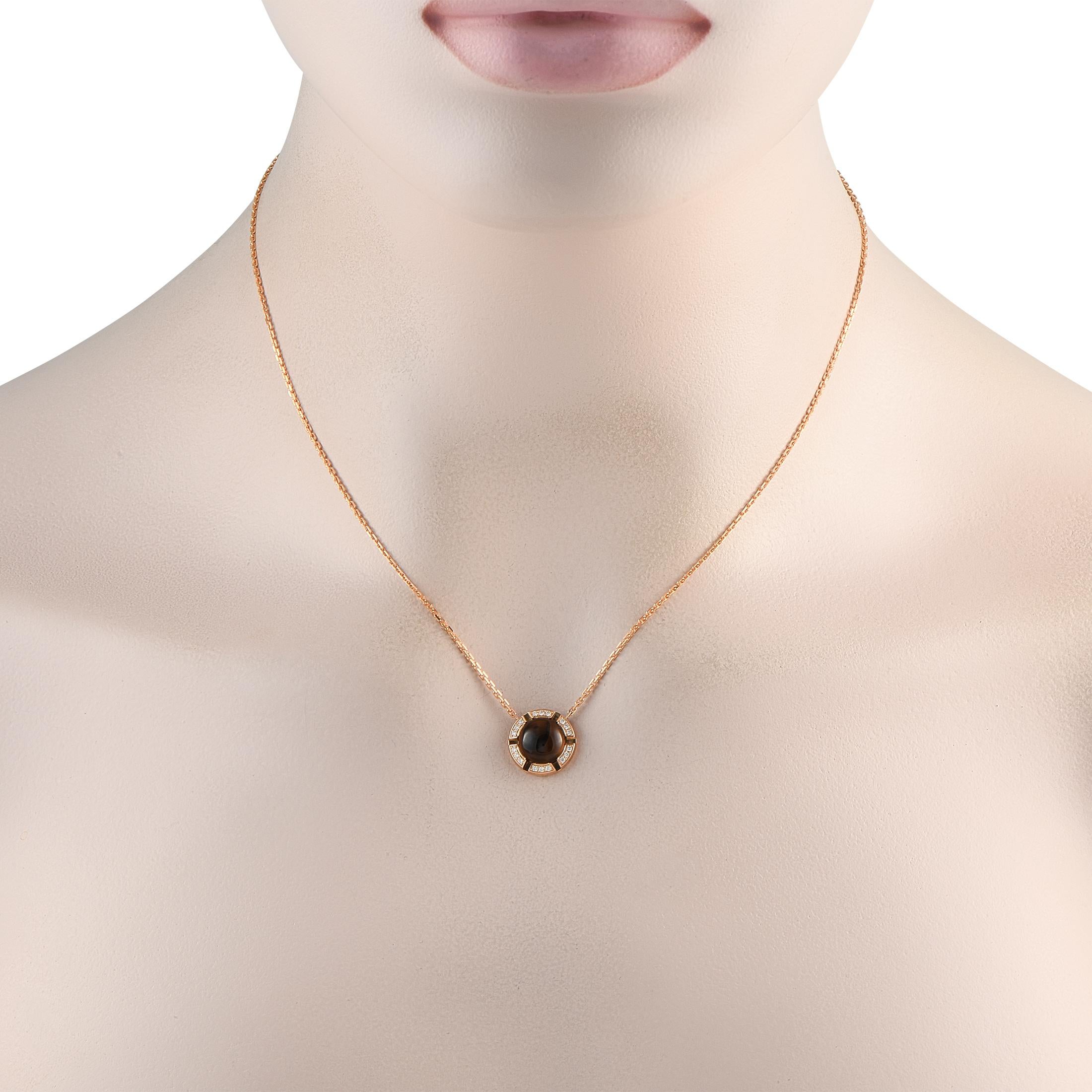 Introducing a necklace from Chaumet inspired by Parisian elegance and effortless glamour. This rose gold stunner features a 16 long chain with a lobster clasp and a 0.50 by 0.50 pendant. The minimalist round pendant features a smokey topaz cabochon