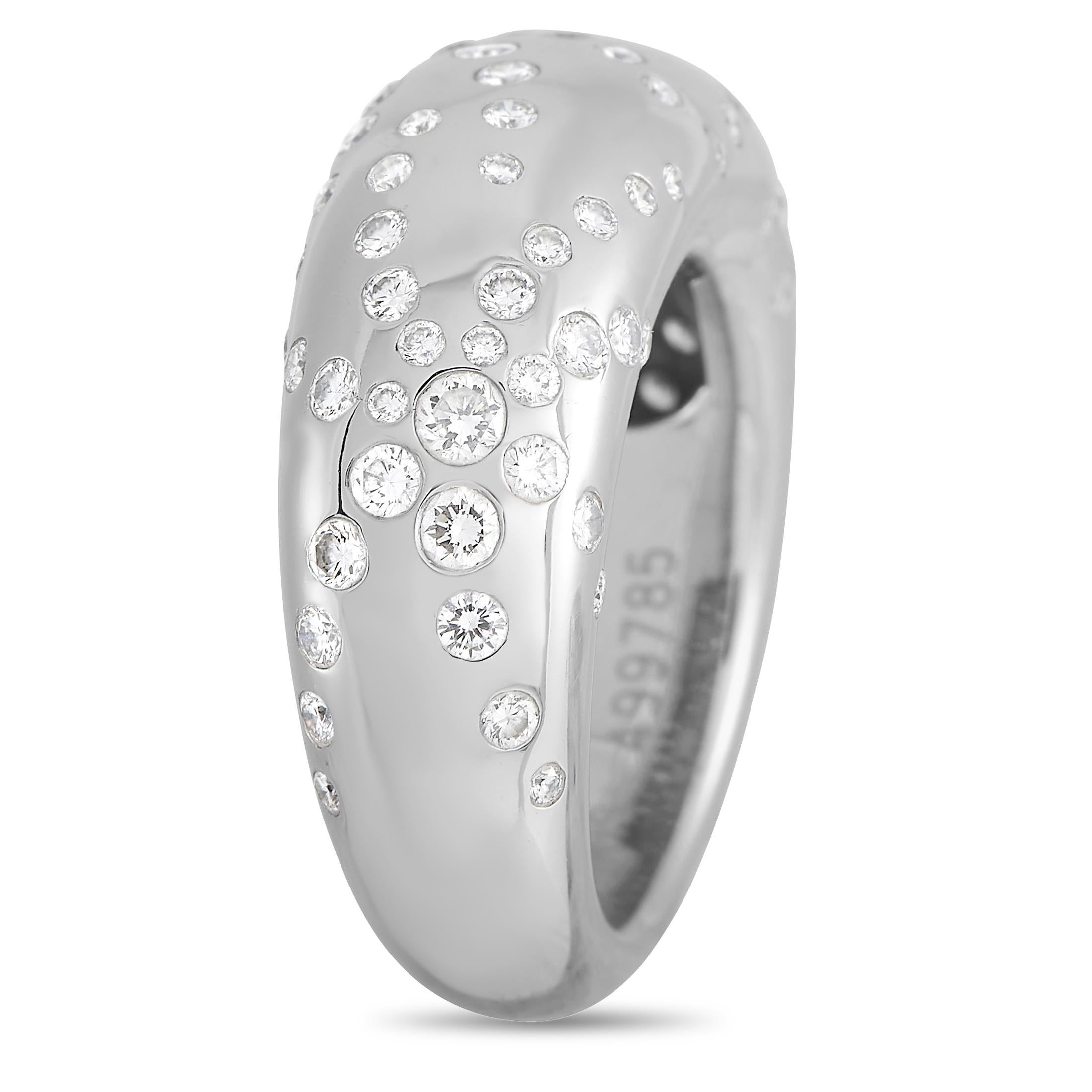 Glittering diamonds totaling 0.65 carats add sparkle and shine to this sleek, simple Chaumet band ring. Crafted from shimmering 18K White Gold, it features a band width and top height measuring 5mm. 
 
 This jewelry piece is offered in estate